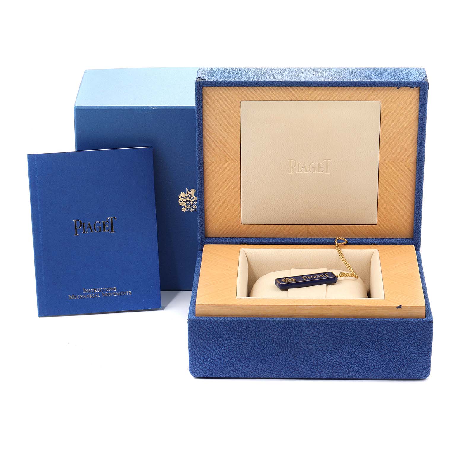 The image shows the packaging box, booklet, and tag of the Piaget M411 Women's Yellow Gold Champagne Dial M411 Women's Yellow Gold Champagne Dial Tanagra 18K Yellow Gold Mechanical Ladies Watch M411 model.