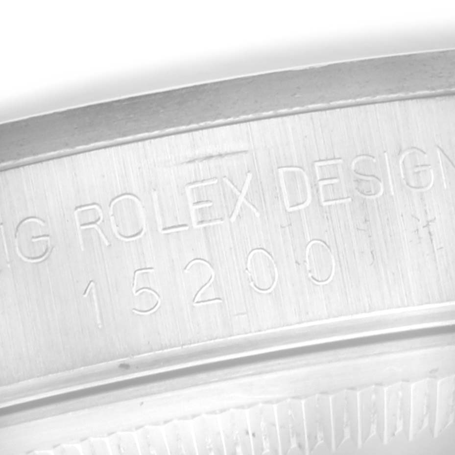 The image shows the inner rim of a Rolex Date 15200 Men
s Stainless Steel White Dial 15200 Men
s Stainless Steel White Dial model, highlighting the engraved model number "15200."