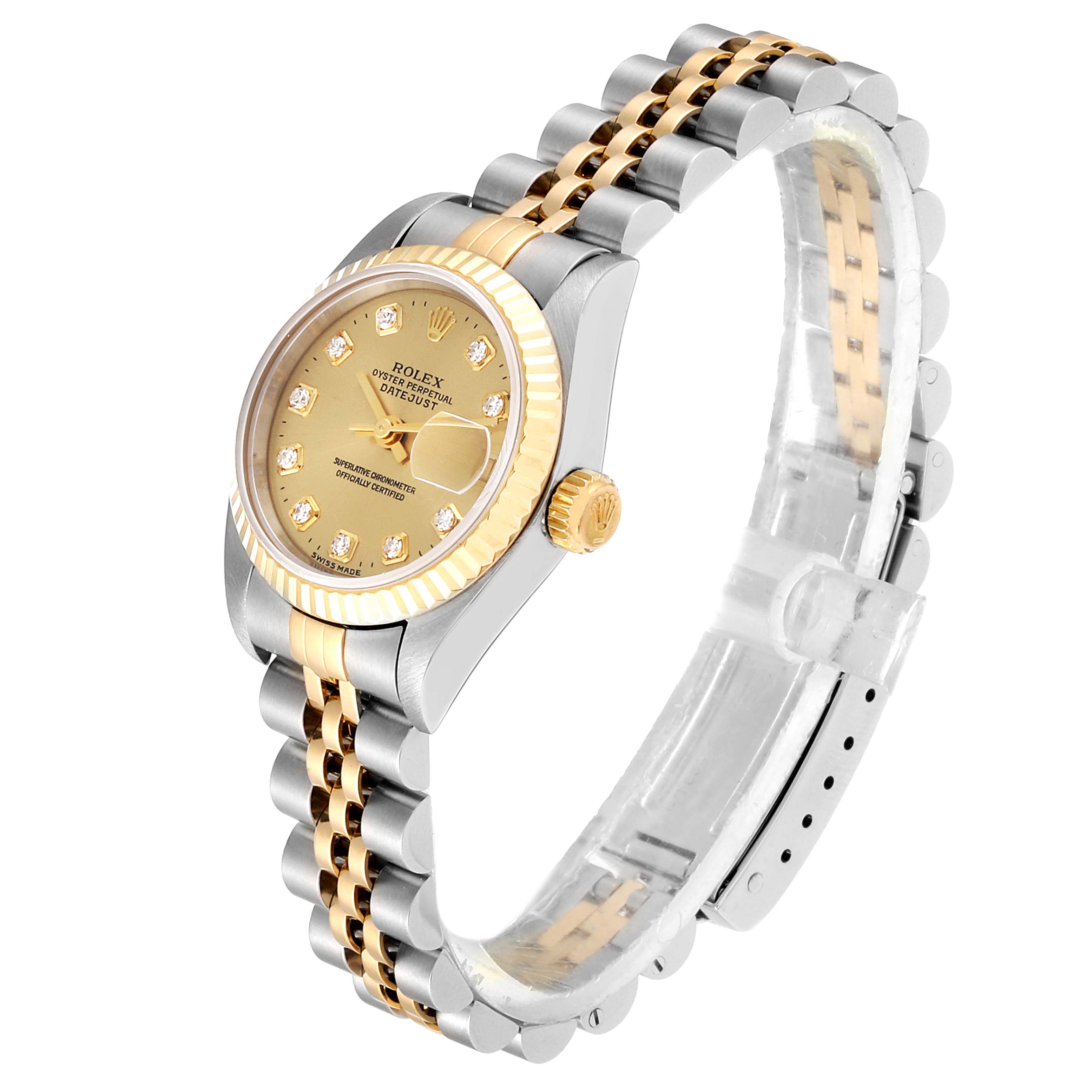 The image shows a side angle of the Rolex Datejust 69173 Women
s Steel and Gold (two tone) Champagne Dial 69173 Women
s Steel and Gold (two tone) Champagne Dial watch, highlighting the dial, bezel, crown, and two-toned bracelet.
