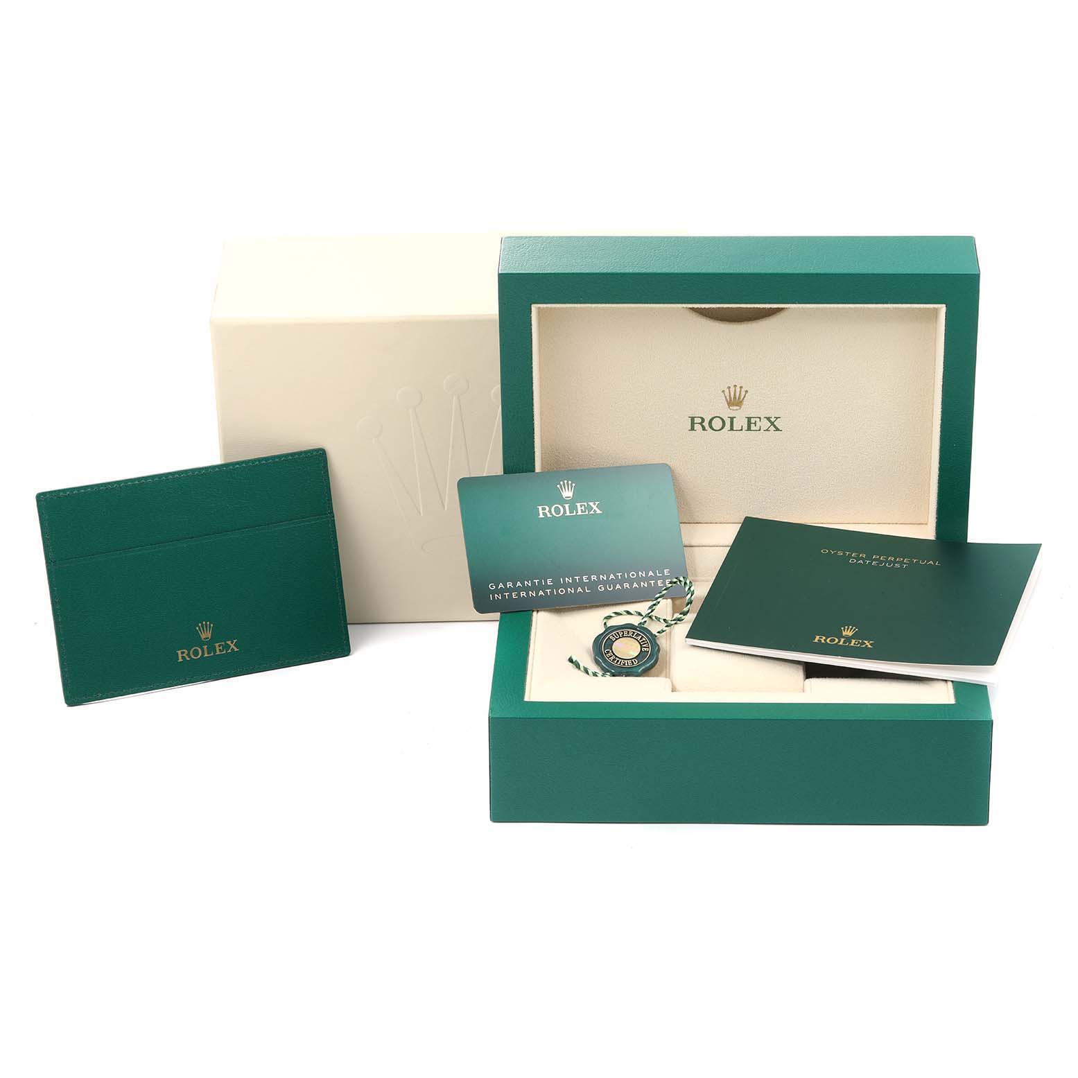 This image of a Rolex Datejust 279174 Women
s Stainless Steel White Dial 279174 Women
s Stainless Steel White Dial watch set includes the watch box, warranty card, manual, card holder, and tag arranged on display.