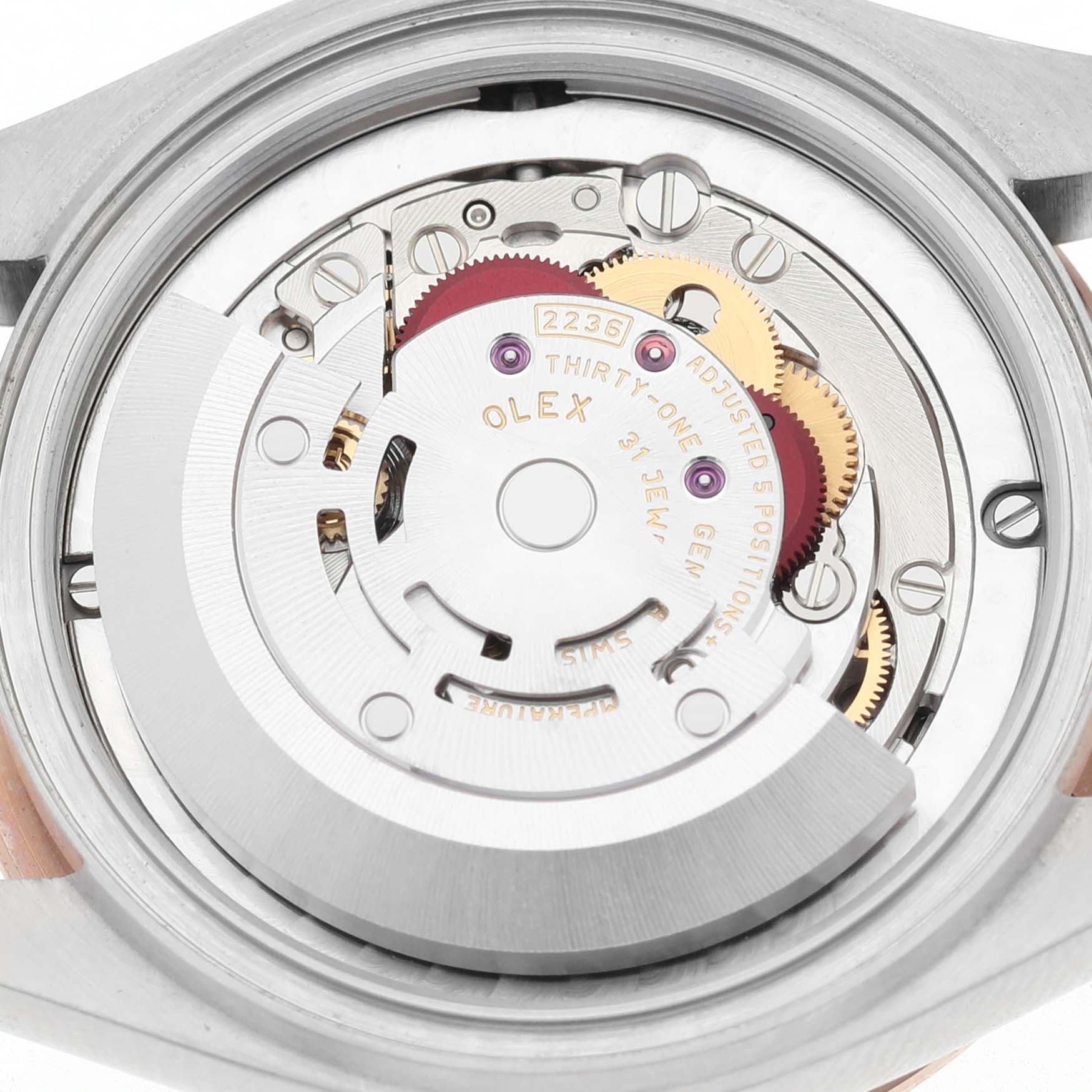 The image shows the internal movement of a Rolex Mid-Size 278341RBR Women's Stainless Steel Pink Dial watch from a top-down angle.