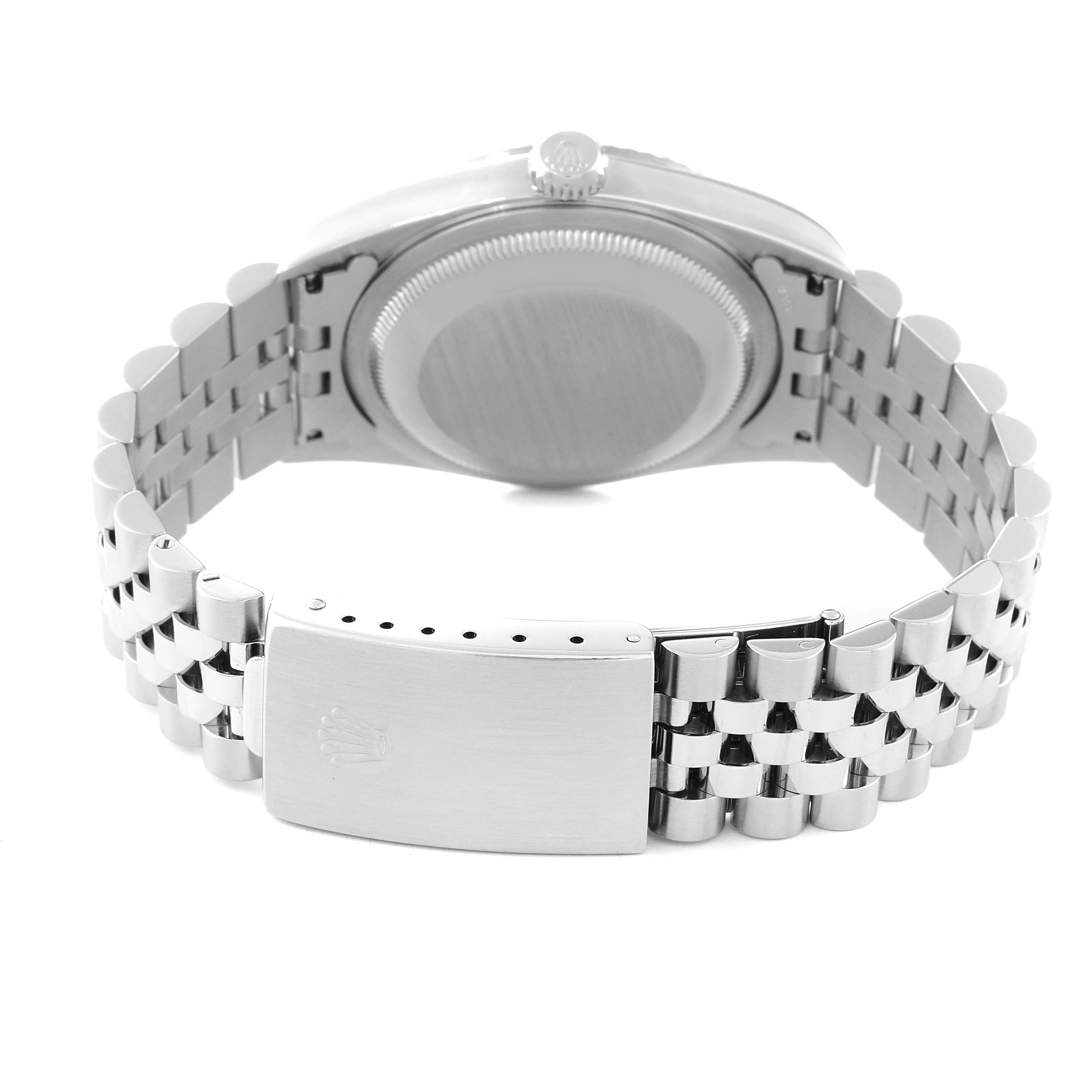 The image shows the back of a Rolex Datejust 16234 Men's Stainless Steel Black Dial 16234 Men's Stainless Steel Black Dial watch, featuring its clasp and bracelet.