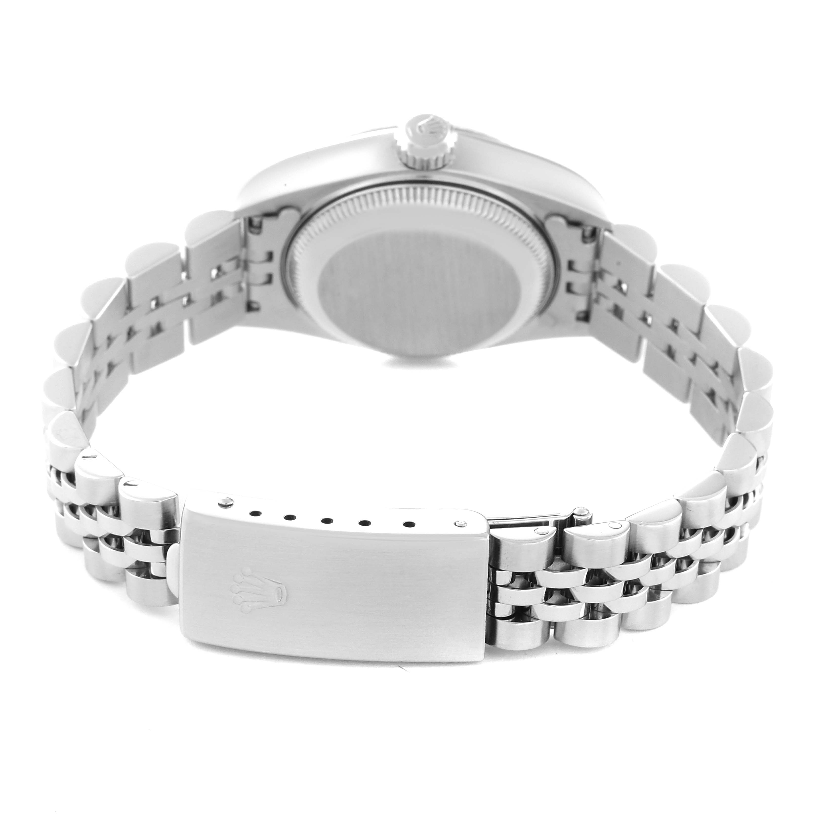 The image shows the back view of a Rolex Datejust 79174 Women's Stainless Steel Blue Dial 79174 Women's Stainless Steel Blue Dial watch, highlighting the case, bezel, crown, and bracelet with the clasp.