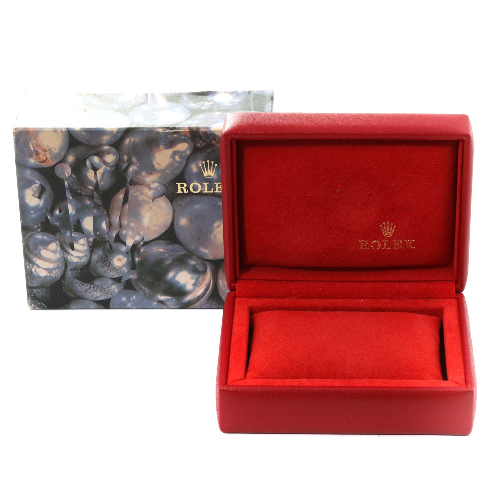 The image shows a Rolex Datejust 79174 Women's Stainless Steel Blue Dial 79174 Women's Stainless Steel Blue Dial watch box and packaging, with the lid open, revealing the red interior.