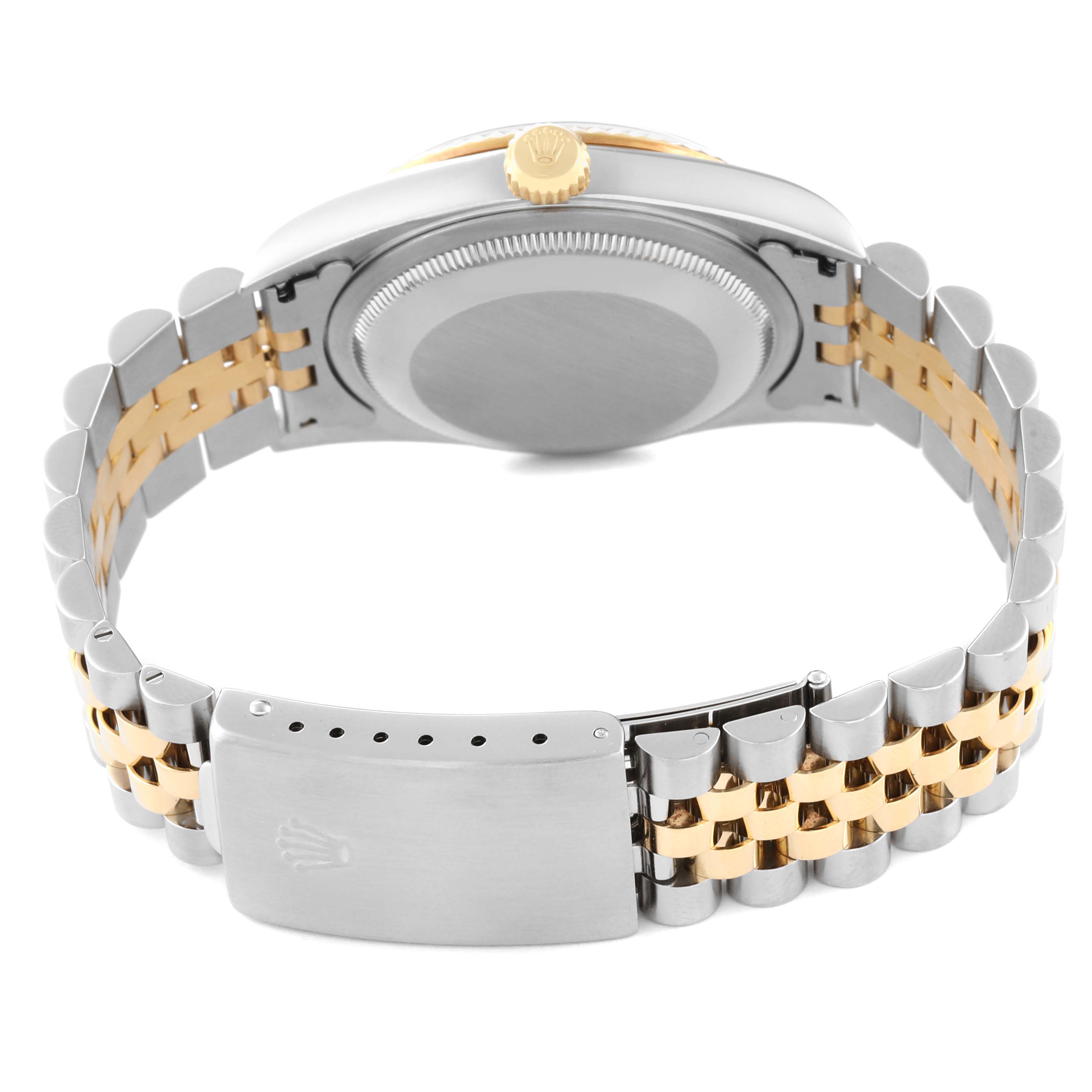 The image shows the back case and the Jubilee bracelet clasp of a Rolex Datejust 16233 Men's Steel and Gold (two tone) Champagne Dial 16233 Men's Steel and Gold (two tone) Champagne Dial watch.