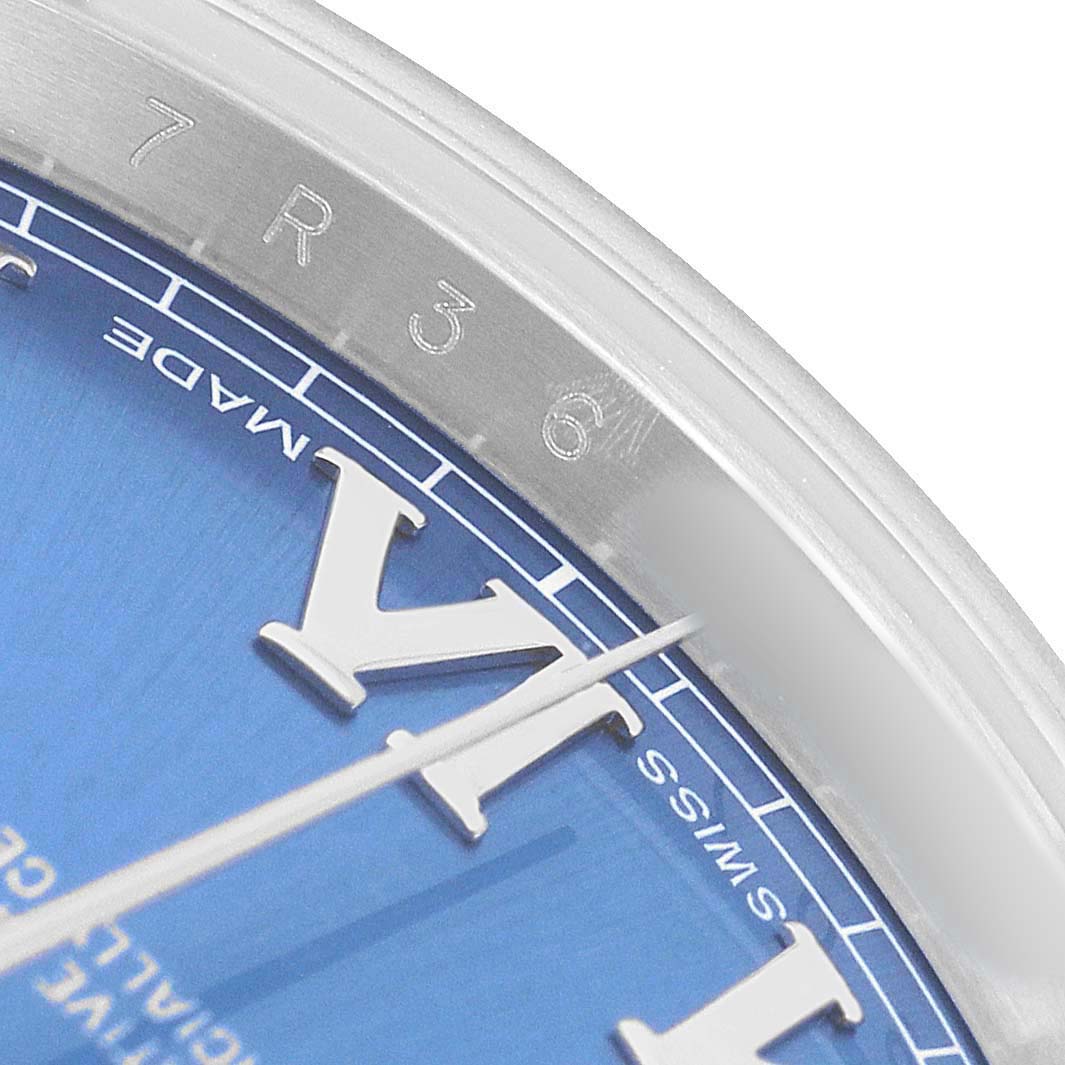 The image shows a close-up of the dial and bezel of the Rolex Datejust 41 116300 Men's Stainless Steel Blue Dial, highlighting the watch's blue dial and Roman numeral markers.