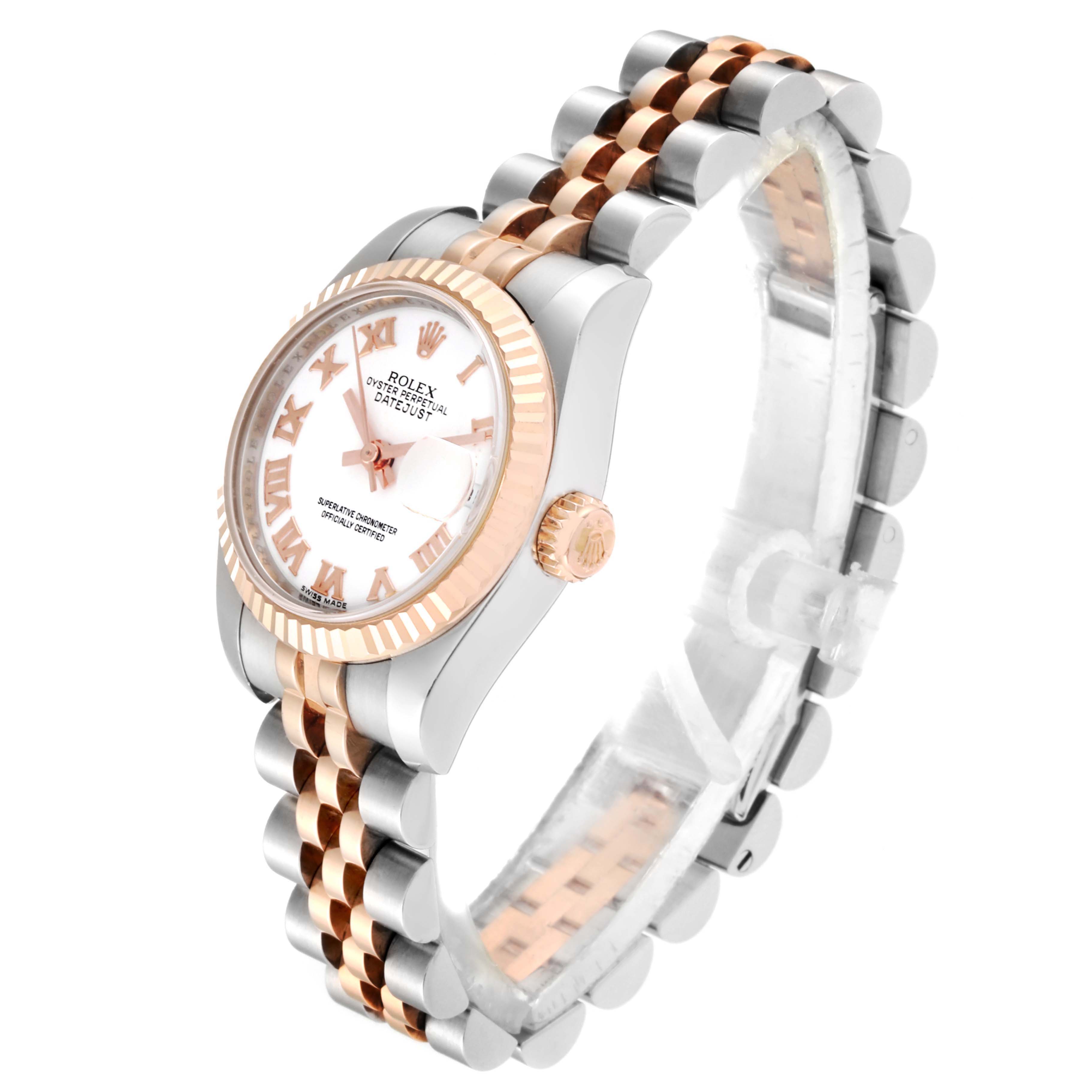 The Rolex Datejust 179171 Women
s Steel and Gold (two tone) White Dial 179171 Women
s Steel and Gold (two tone) White Dial watch is shown from an angled side view, highlighting its rose and silver-tone Jubilee bracelet and white dial.