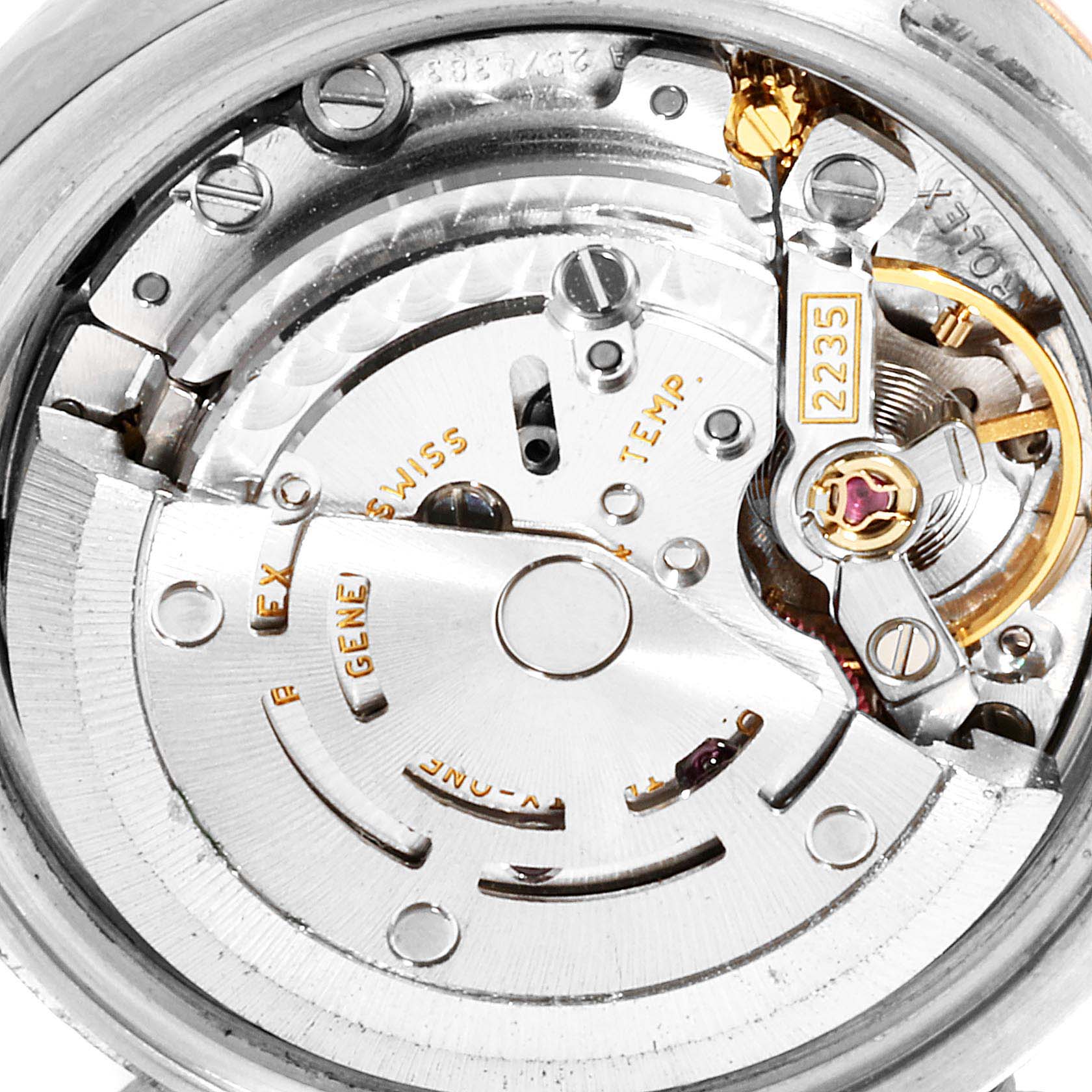 The image shows a close-up of the Rolex Datejust 179171 Women
s Steel and Gold (two tone) White Dial 179171 Women
s Steel and Gold (two tone) White Dial movement, showcasing the intricate mechanics and internal components.