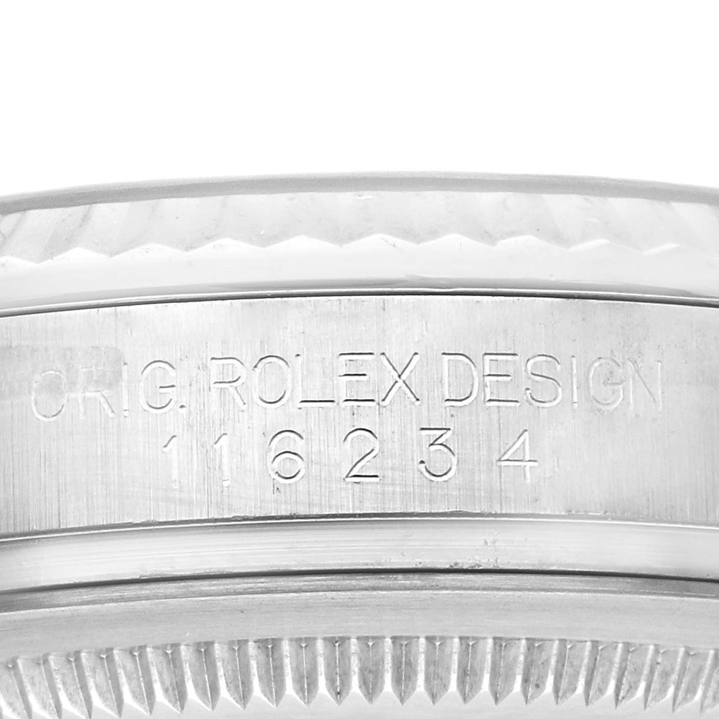 This close-up image shows the engraved side of the case and bezel of a Rolex Datejust 116234 Men's Stainless Steel Black Dial 116234 Men's Stainless Steel Black Dial watch.