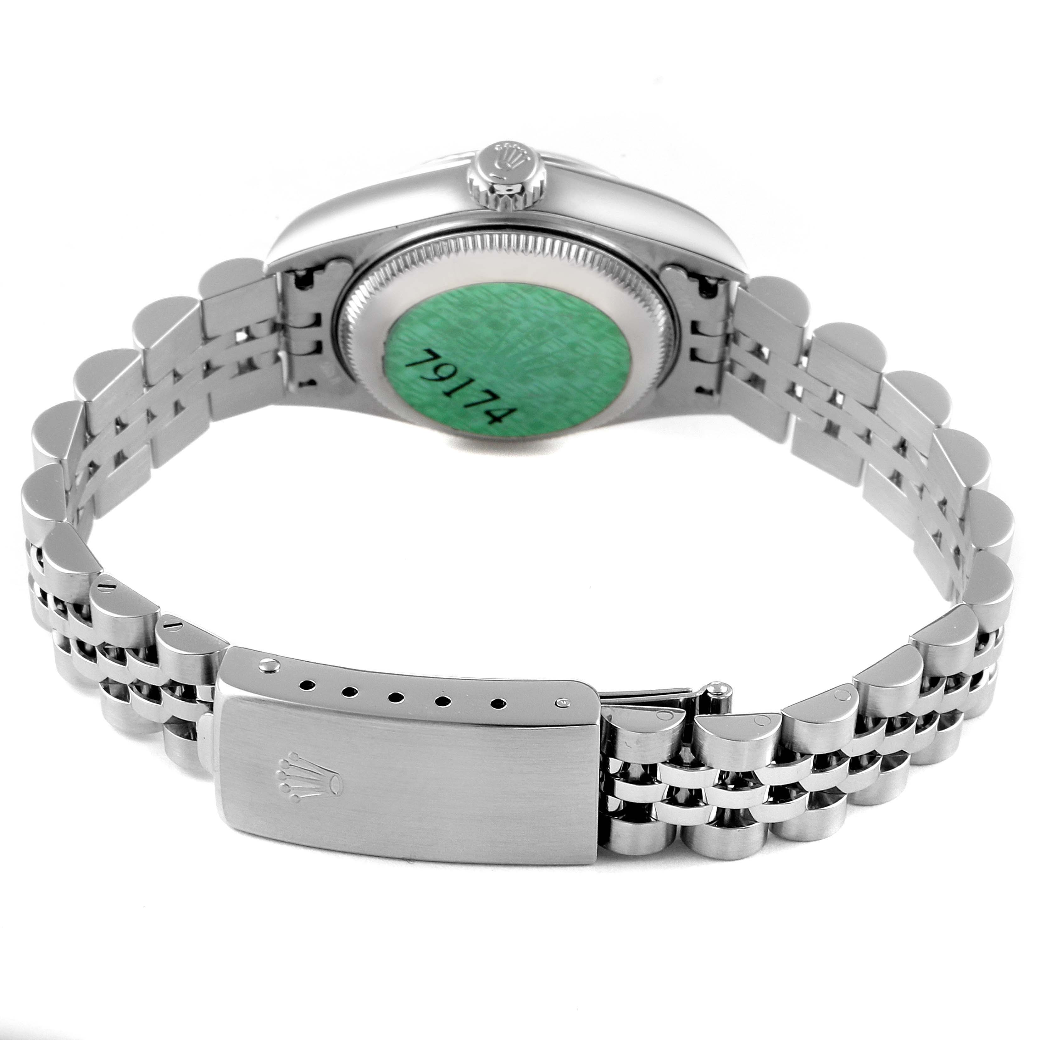 This image shows the back angle of the Rolex Datejust 79174 Women
s Stainless Steel Mother of Pearl Dial 79174 Women
s Stainless Steel Mother of Pearl Dial, highlighting the bracelet clasp and case back.