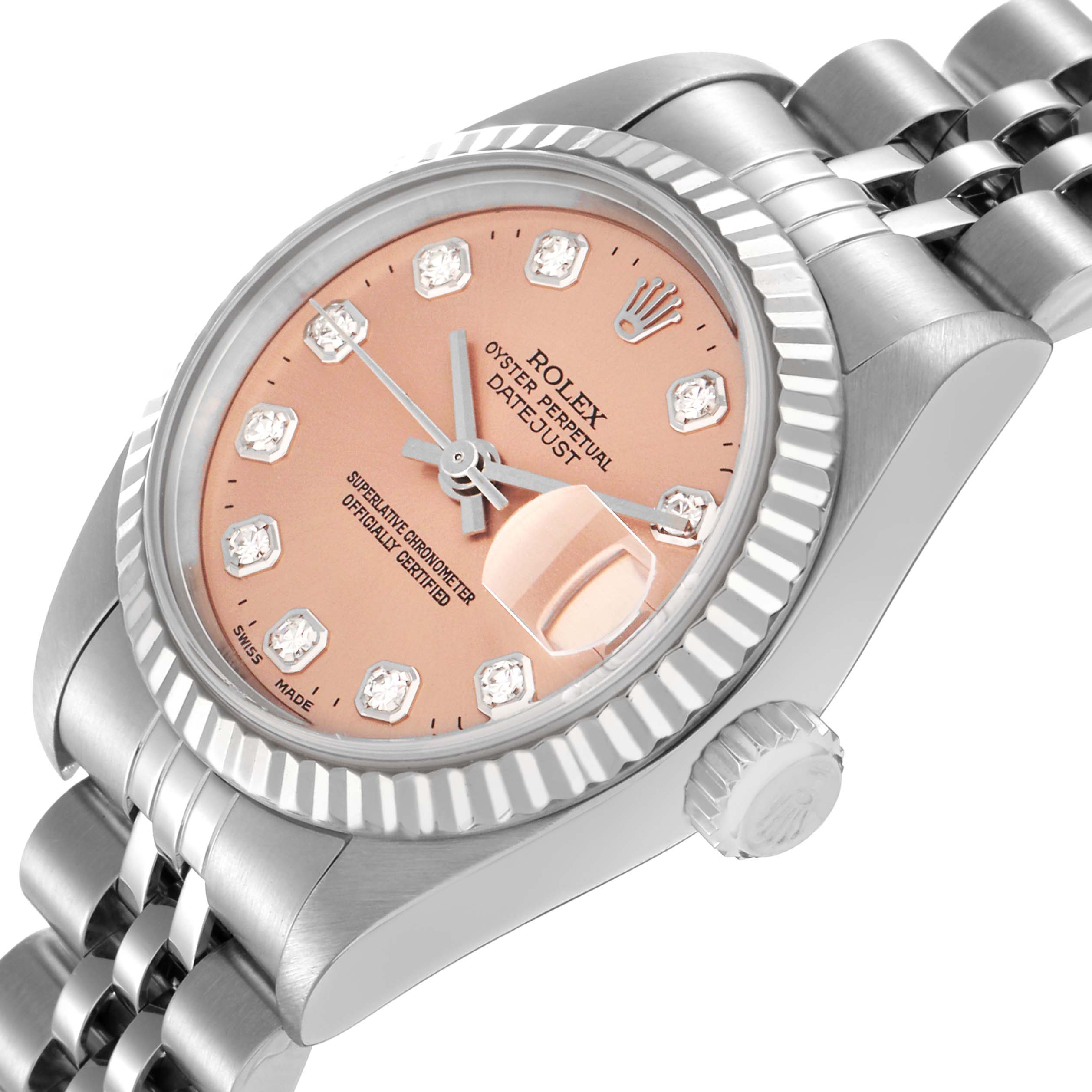 The watch is a Rolex Datejust 79174 Women
s Stainless Steel Pink Dial 79174 Women
s Stainless Steel Pink Dial shown at an oblique angle, displaying the dial, bezel, bracelet, and crown.
