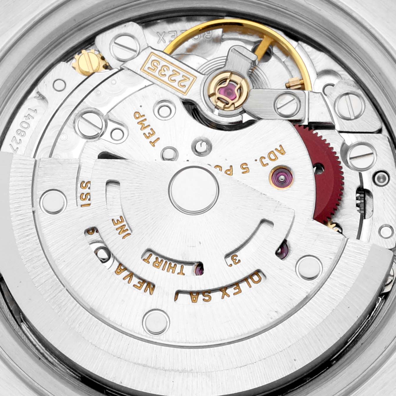 The image shows a close-up of the movement mechanism of a Rolex Datejust 79174 Women's Stainless Steel Silver Dial 79174 Women's Stainless Steel Silver Dial watch, highlighting the intricate mechanical parts.