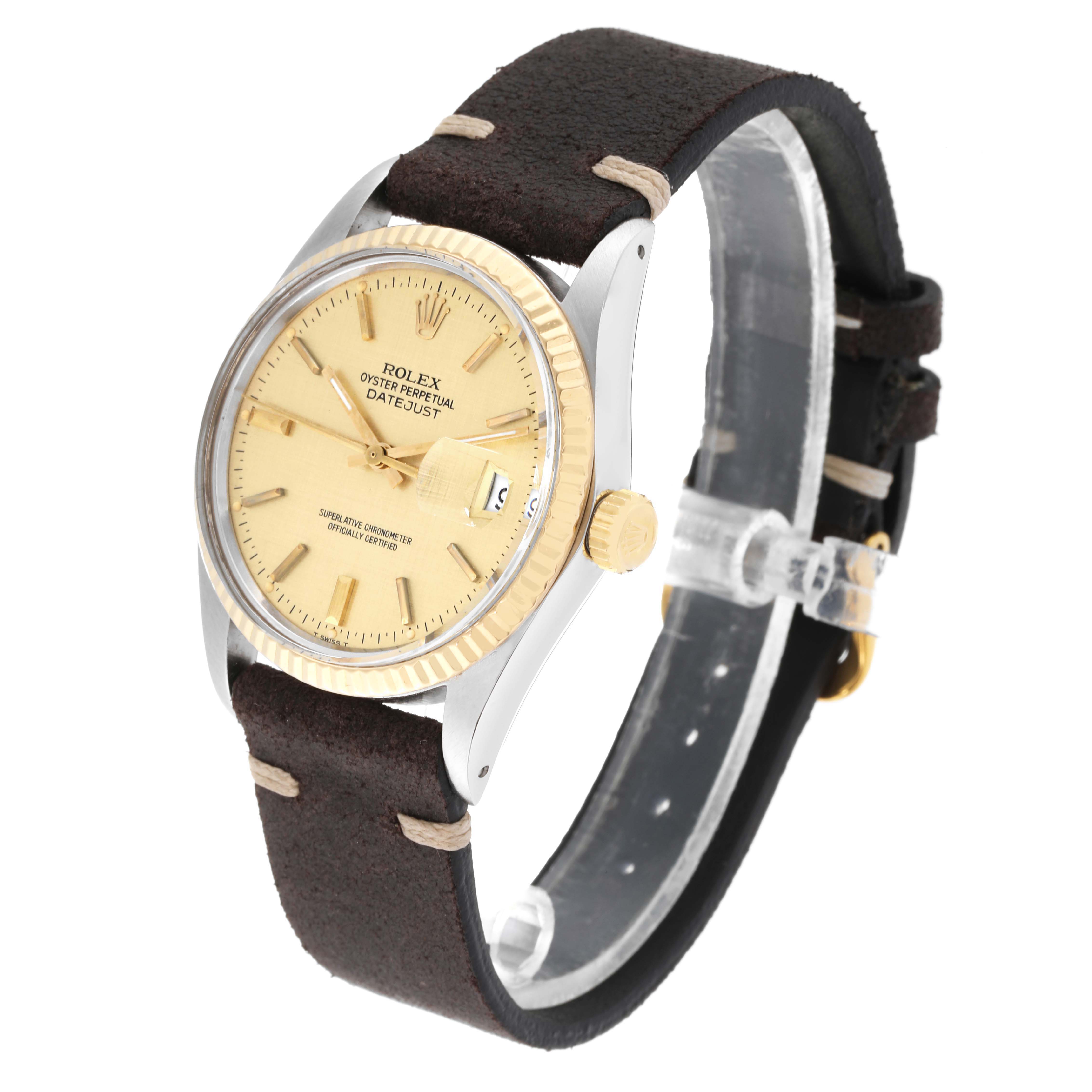 The Vintage Collection Rolex watch is shown at an angle highlighting the face, crown, bezel, and leather strap.