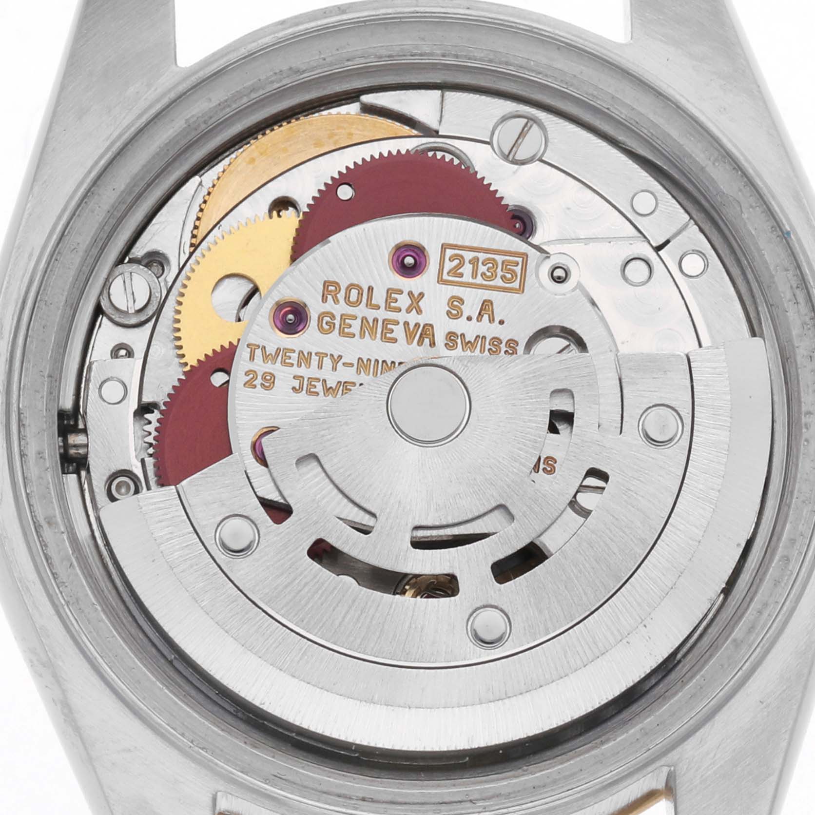 The image shows the movement of a Rolex Datejust 69173 Women
s Steel and Gold (two tone) Champagne Dial 69173 Women
s Steel and Gold (two tone) Champagne Dial, highlighting gears and components from a top-down angle.