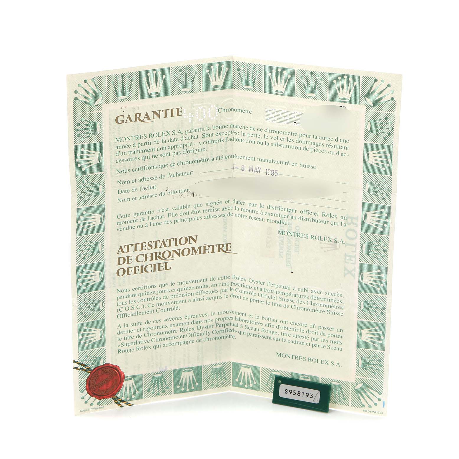 The image shows a Rolex Datejust 69173 Women
s Steel and Gold (two tone) Champagne Dial 69173 Women
s Steel and Gold (two tone) Champagne Dial warranty certificate angled slightly forward, displaying the text and Rolex branding.