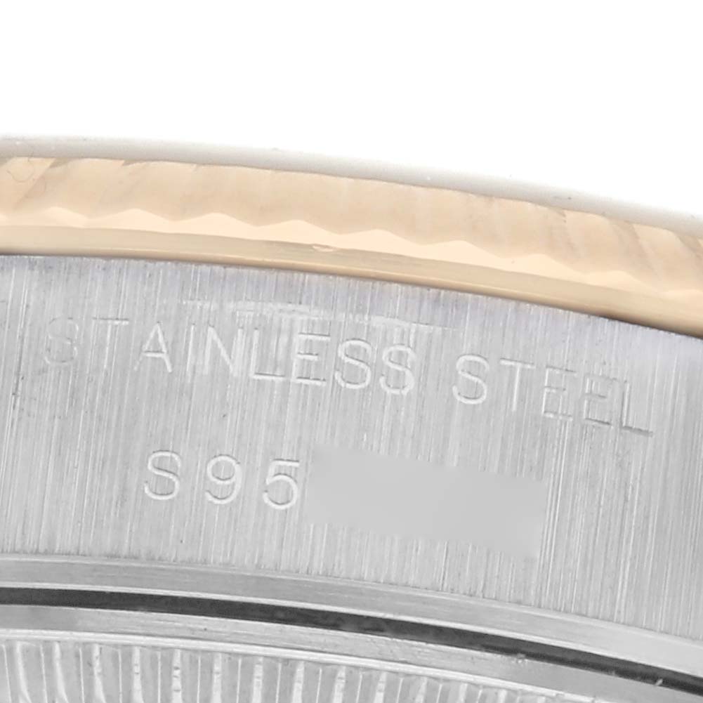 This image shows a close-up of the stainless steel case back of a Rolex Datejust 69173 Women
s Steel and Gold (two tone) Champagne Dial 69173 Women
s Steel and Gold (two tone) Champagne Dial watch.