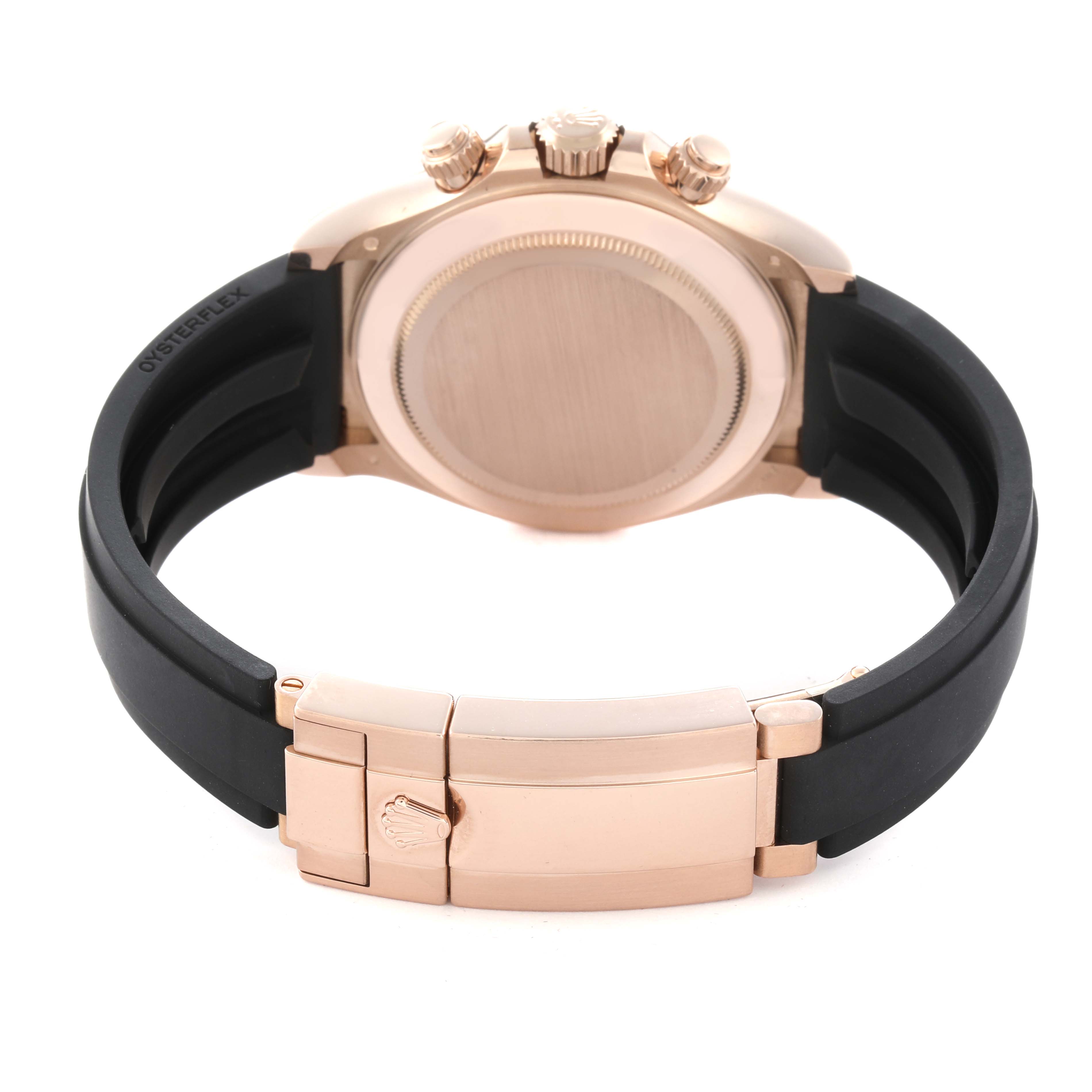 The image shows the back view of a Rolex Daytona 116515 Men's Rose Gold Brown Dial 116515 Men's Rose Gold Brown Dial, highlighting the case back, crown, pushers, and black strap with clasp.