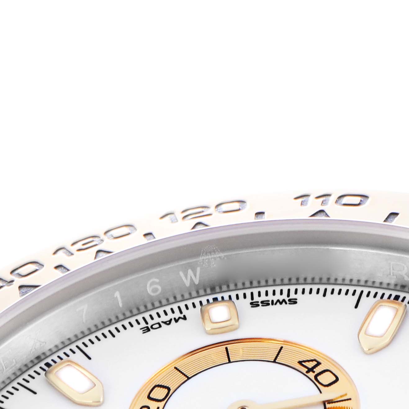 The image shows a partial close-up of the Rolex Daytona 116503 Men
s Steel and Gold (two tone) White Dial 116503 Men
s Steel and Gold (two tone) White Dial
s bezel and dial, highlighting the tachymetric scale and markers.
