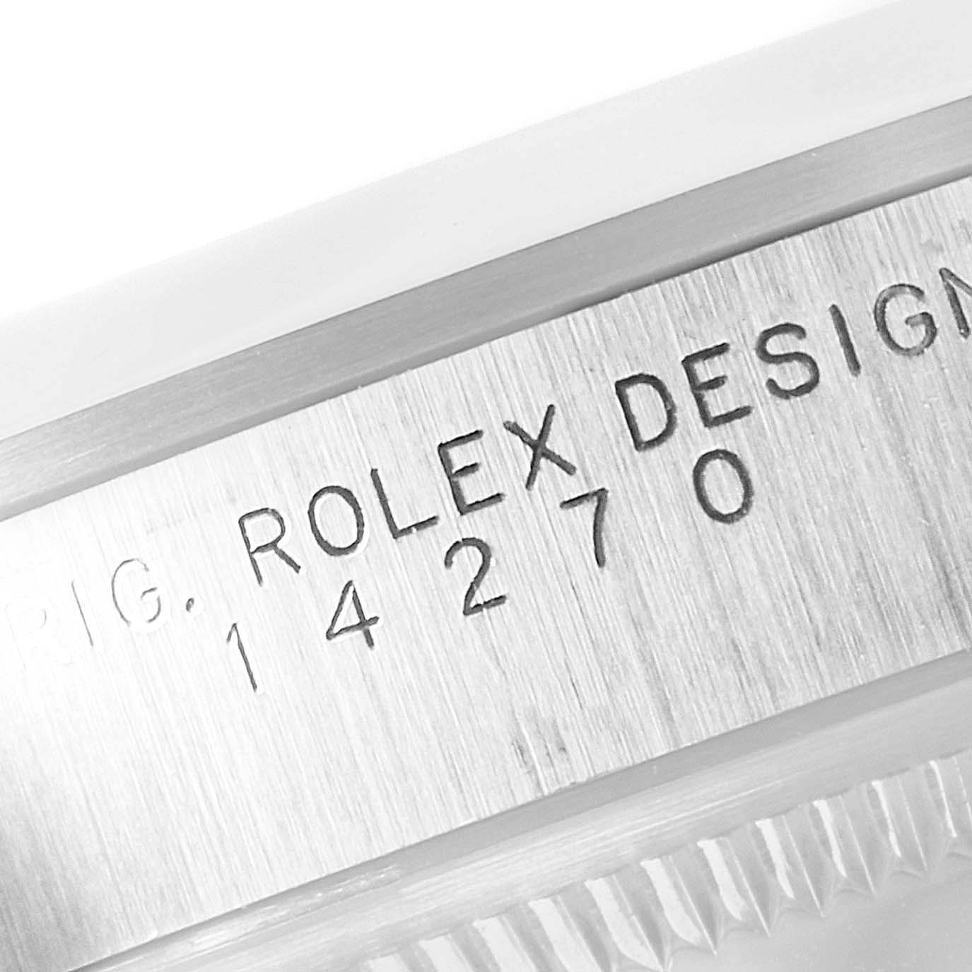 This image shows a close-up of the case of a Rolex Explorer 14270 Men's Stainless Steel Black Dial 14270 Men's Stainless Steel Black Dial watch focusing on its engraved design and model number.