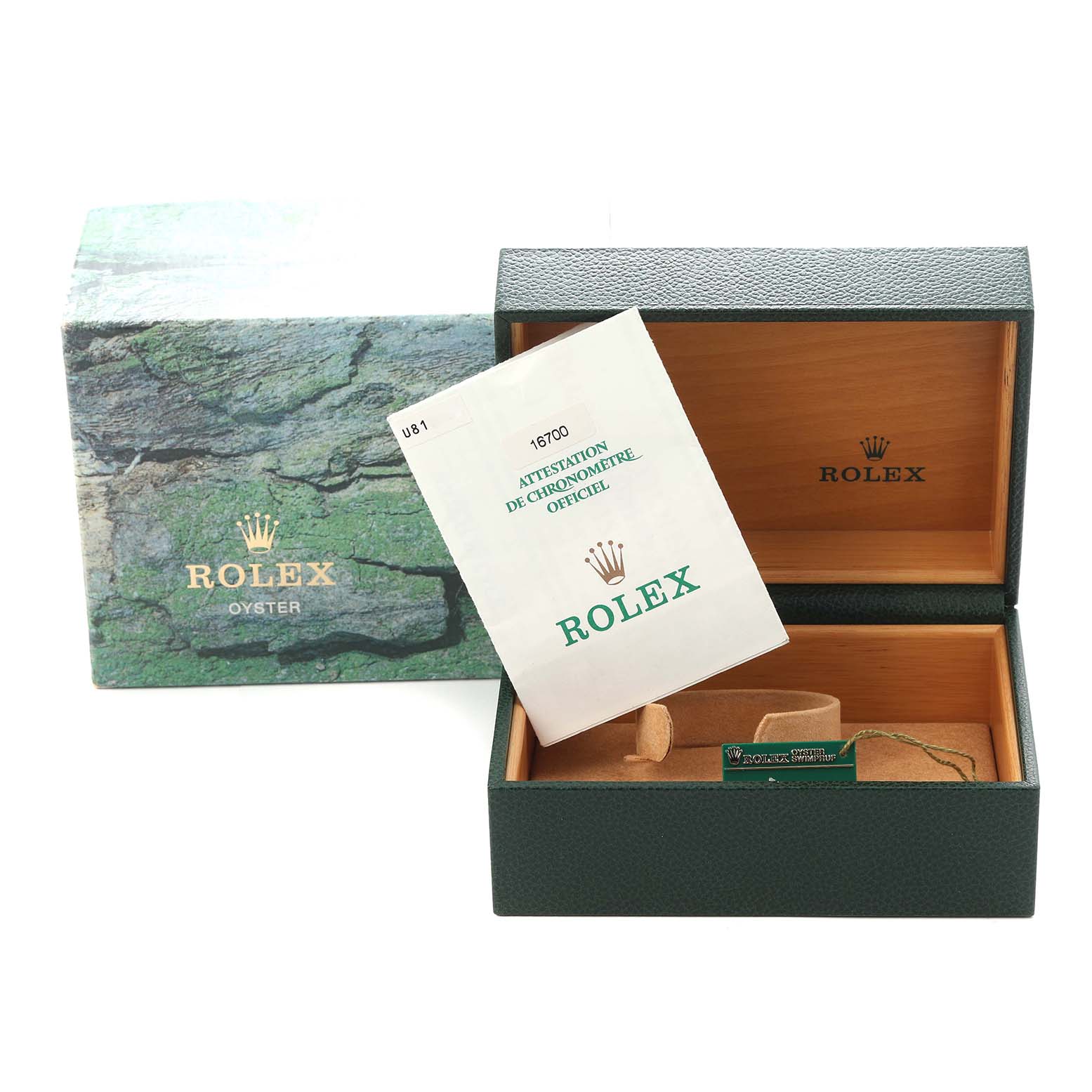 The image shows a Rolex GMT-Master 16700 Men
s Stainless Steel Black Dial 16700 Men
s Stainless Steel Black Dial box, open with its manual and tags displayed.