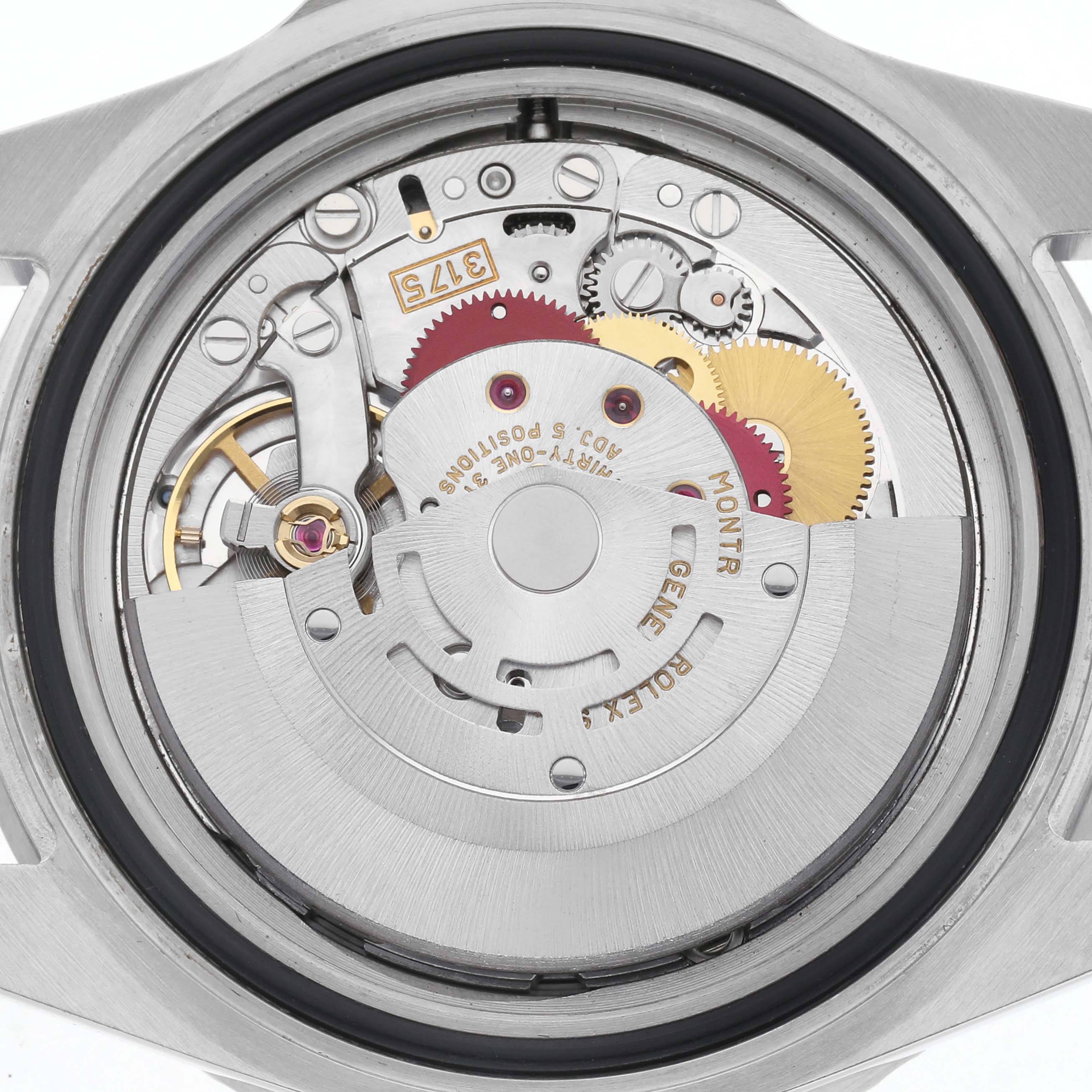 The image shows the movement of a Rolex GMT-Master 16700 Men
s Stainless Steel Black Dial 16700 Men
s Stainless Steel Black Dial watch from the back, highlighting the gears and rotor.