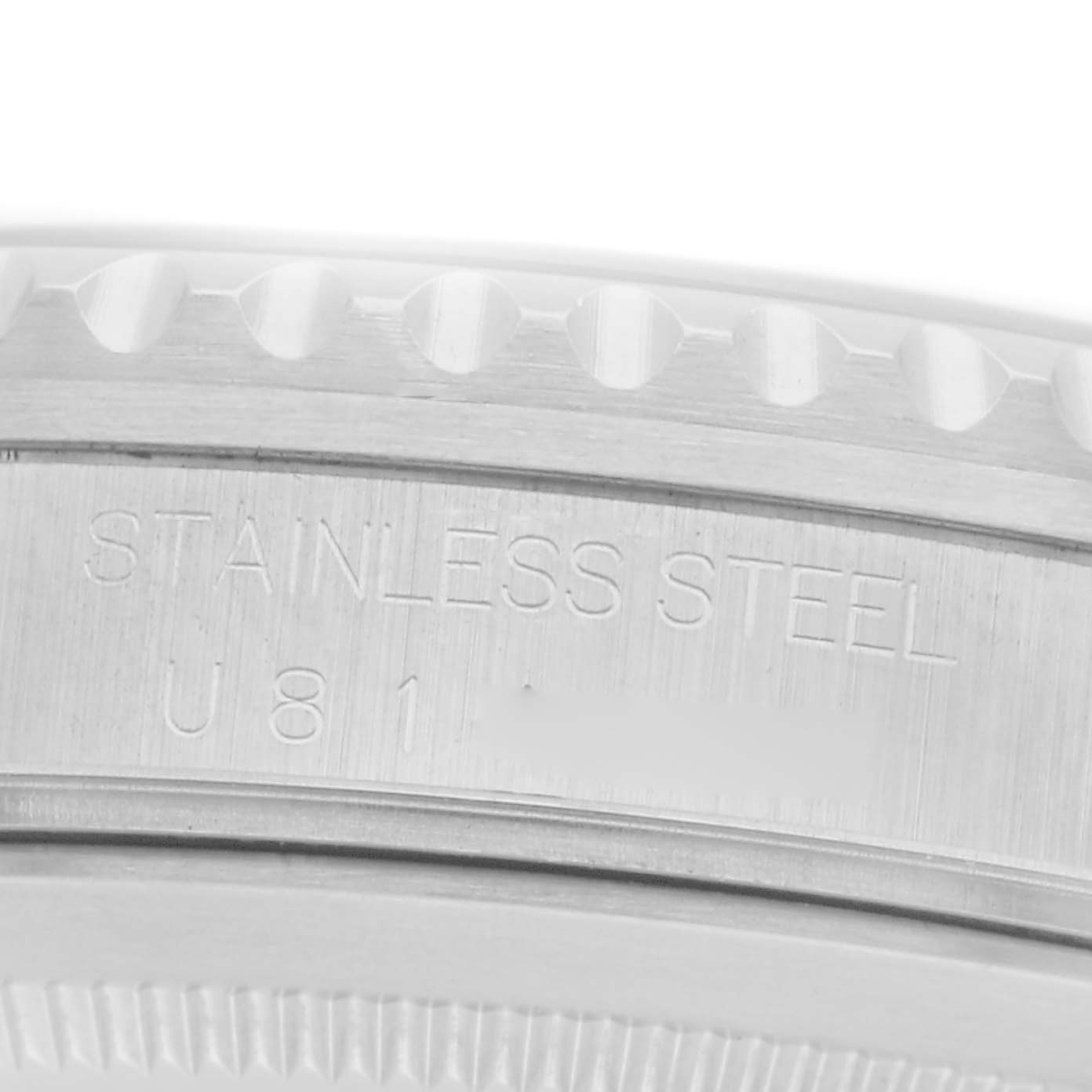 The image shows a close-up of the edge and engraving on the side of a Rolex GMT-Master 16700 Men
s Stainless Steel Black Dial 16700 Men
s Stainless Steel Black Dial watch case.