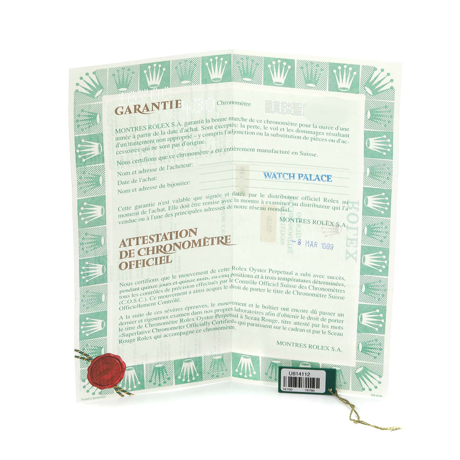 The image shows a warranty and chronometer certificate for the Rolex GMT-Master 16700 Men
s Stainless Steel Black Dial 16700 Men
s Stainless Steel Black Dial, featuring the official seal and a registration tag.