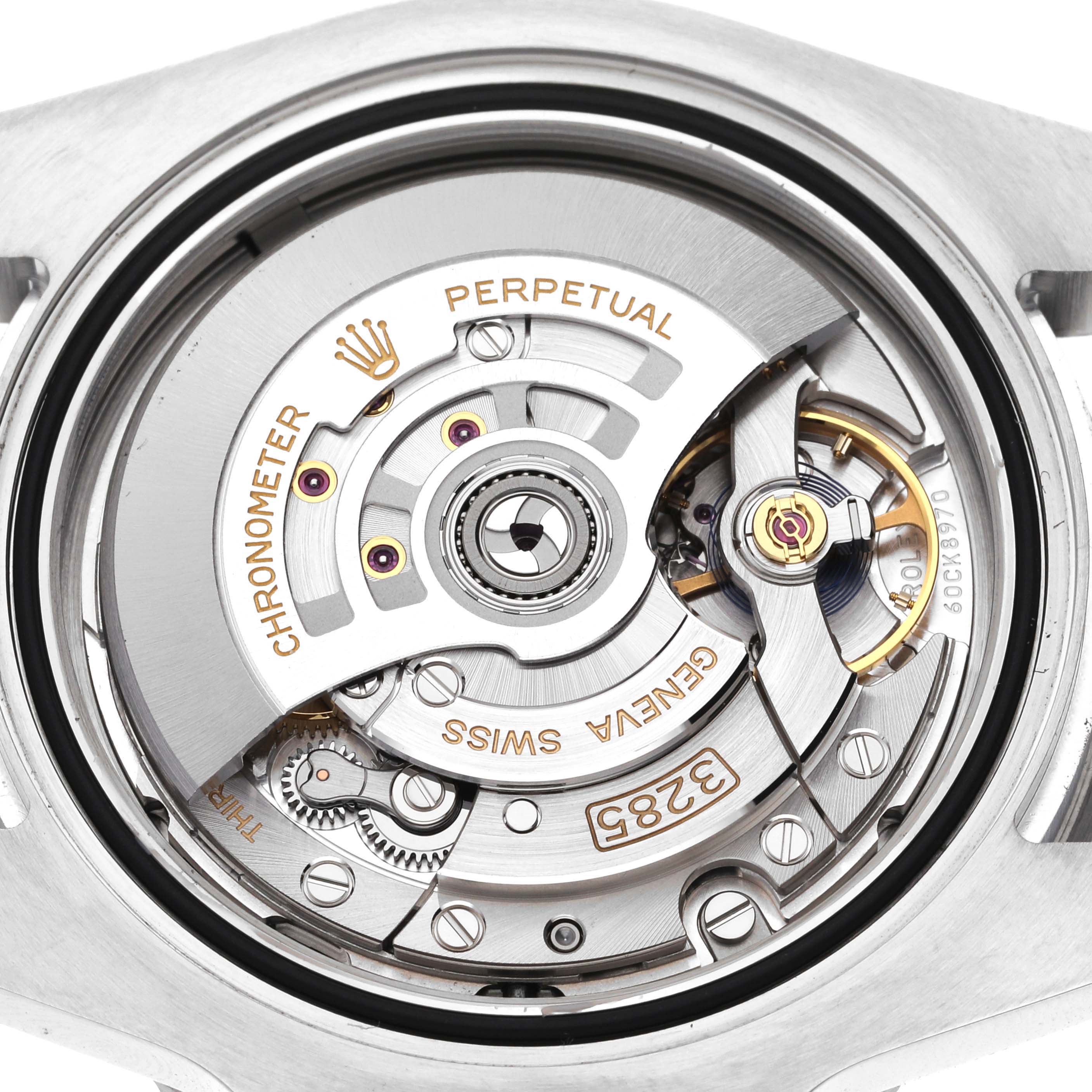 This is a close-up view of the movement and inner mechanics of a Rolex GMT-Master 126710 Men's Stainless Steel Black Dial 126710 Men's Stainless Steel Black Dial watch.