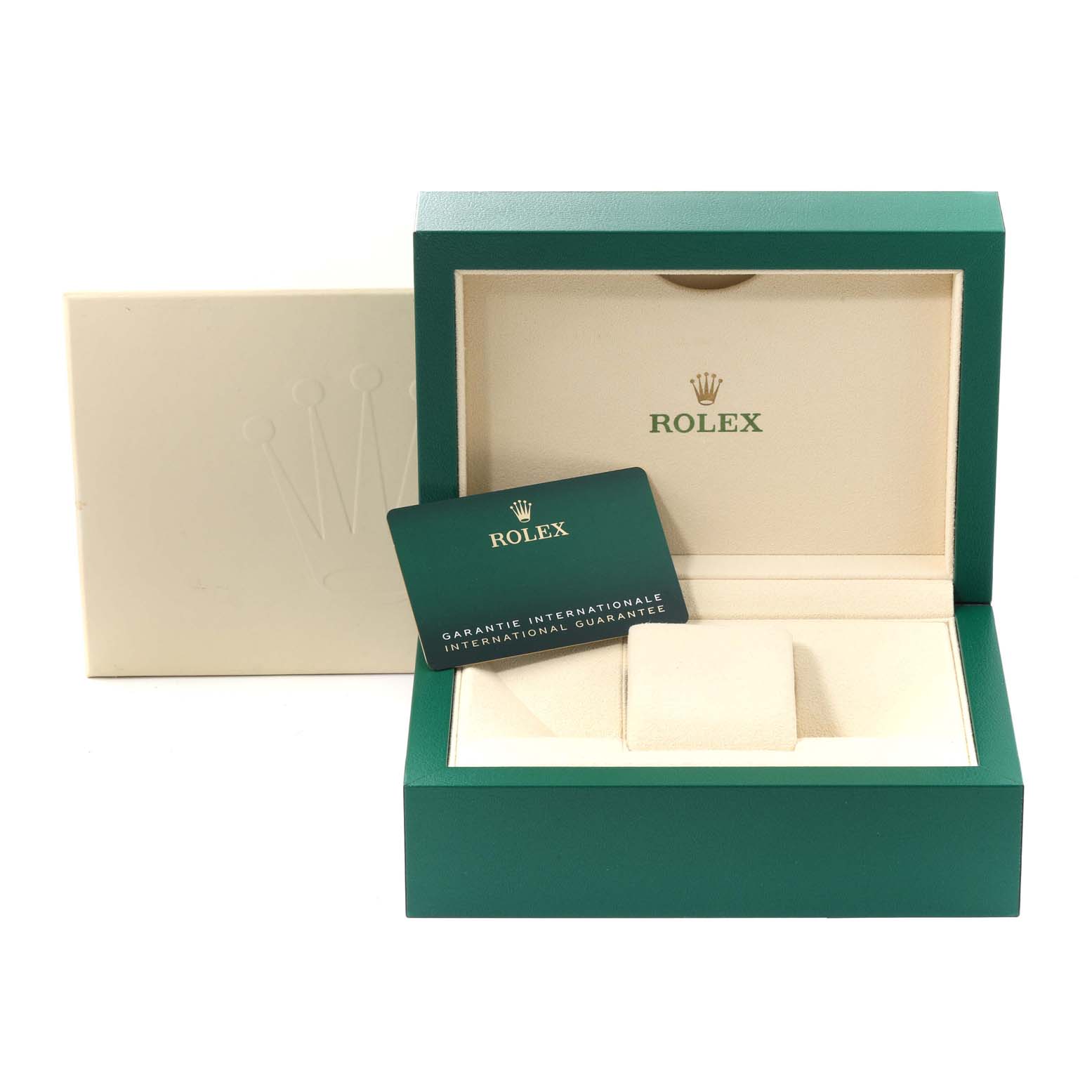 The image shows an open green Rolex watch box for the GMT-Master model with an international guarantee card.