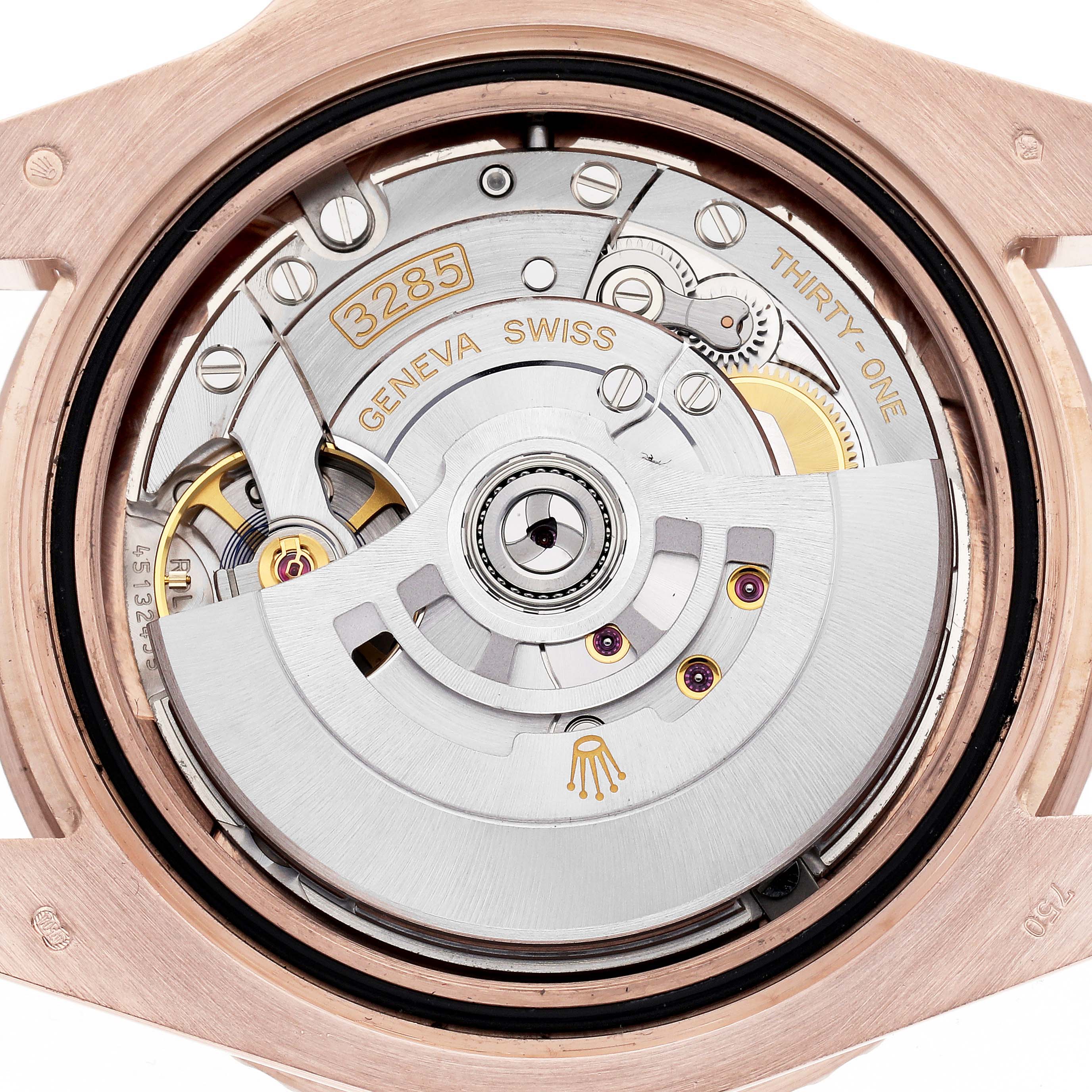 The image shows the movement of a Rolex GMT-Master 126715CHNR Men
s Rose Gold Black Dial 126715CHNR Men
s Rose Gold Black Dial watch, viewed from the back, highlighting the rotor and inner mechanisms.