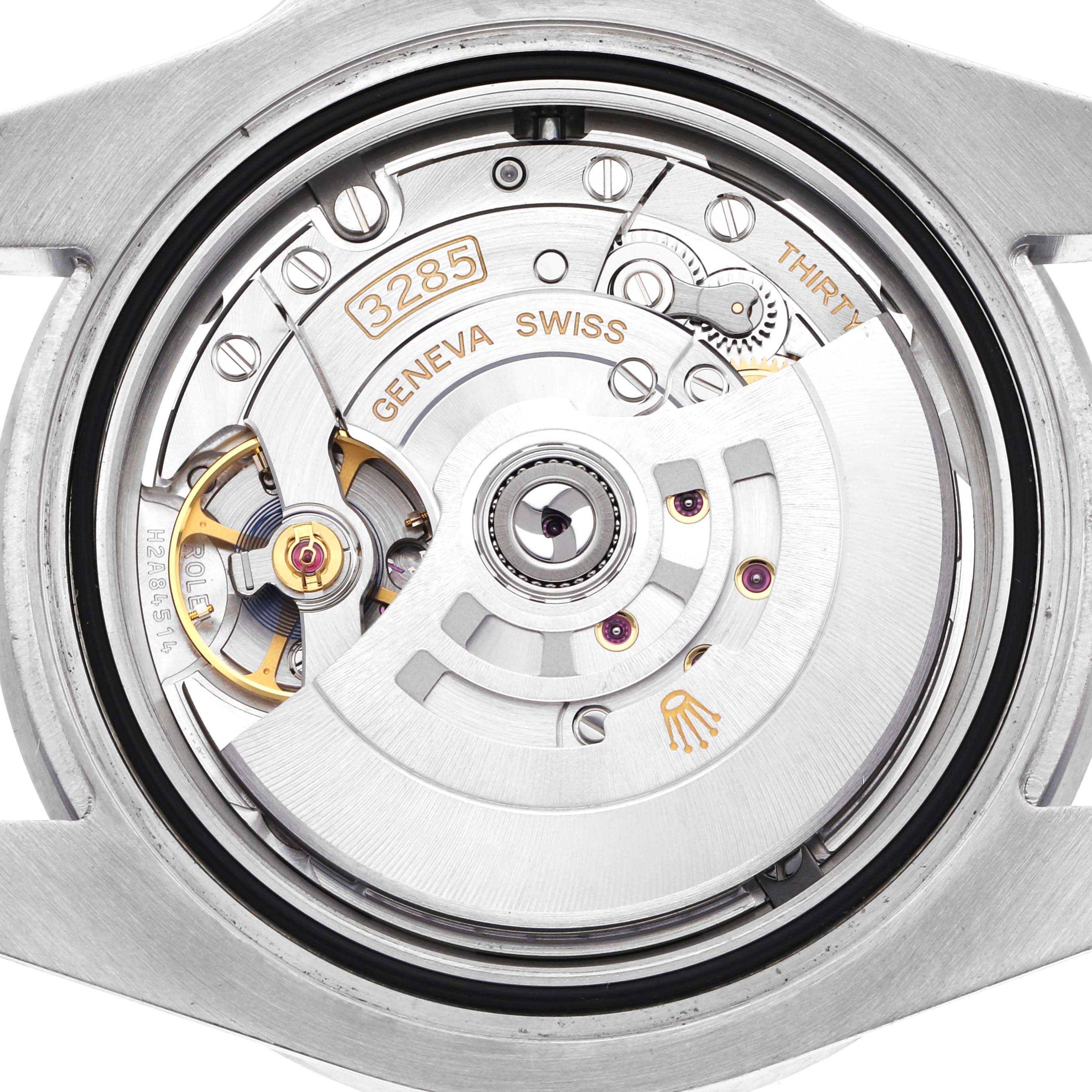 The image shows a top-down view of the Rolex GMT-Master 126710BLRO Men
s Stainless Steel Black Dial 126710BLRO Men
s Stainless Steel Black Dial movement, focusing on its intricate mechanical parts.