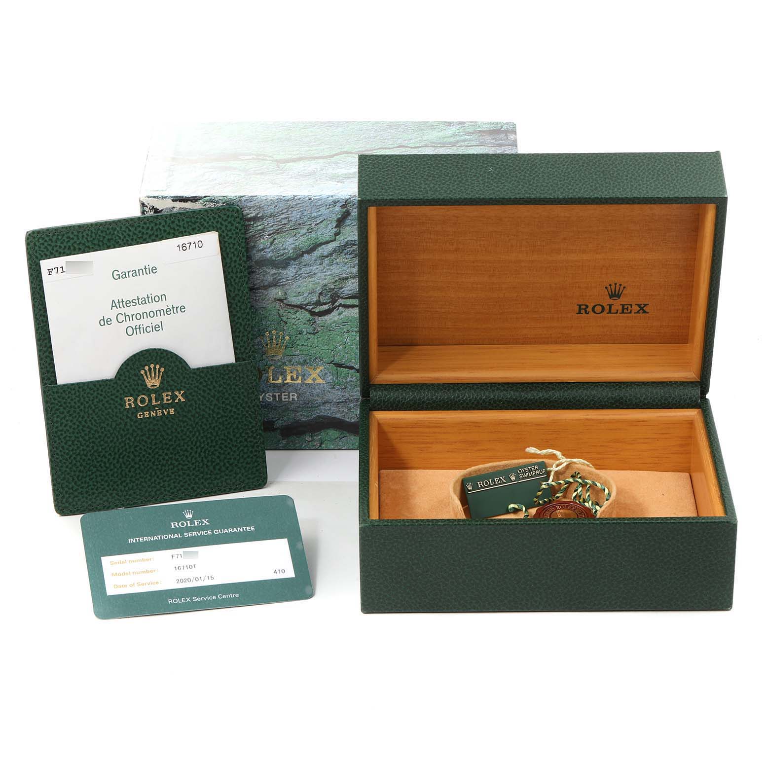 The image shows the packaging and accessories for a Rolex GMT-Master 16710 Men
s Stainless Steel Black Dial 16710 Men
s Stainless Steel Black Dial, including the box, warranty card, and tags.