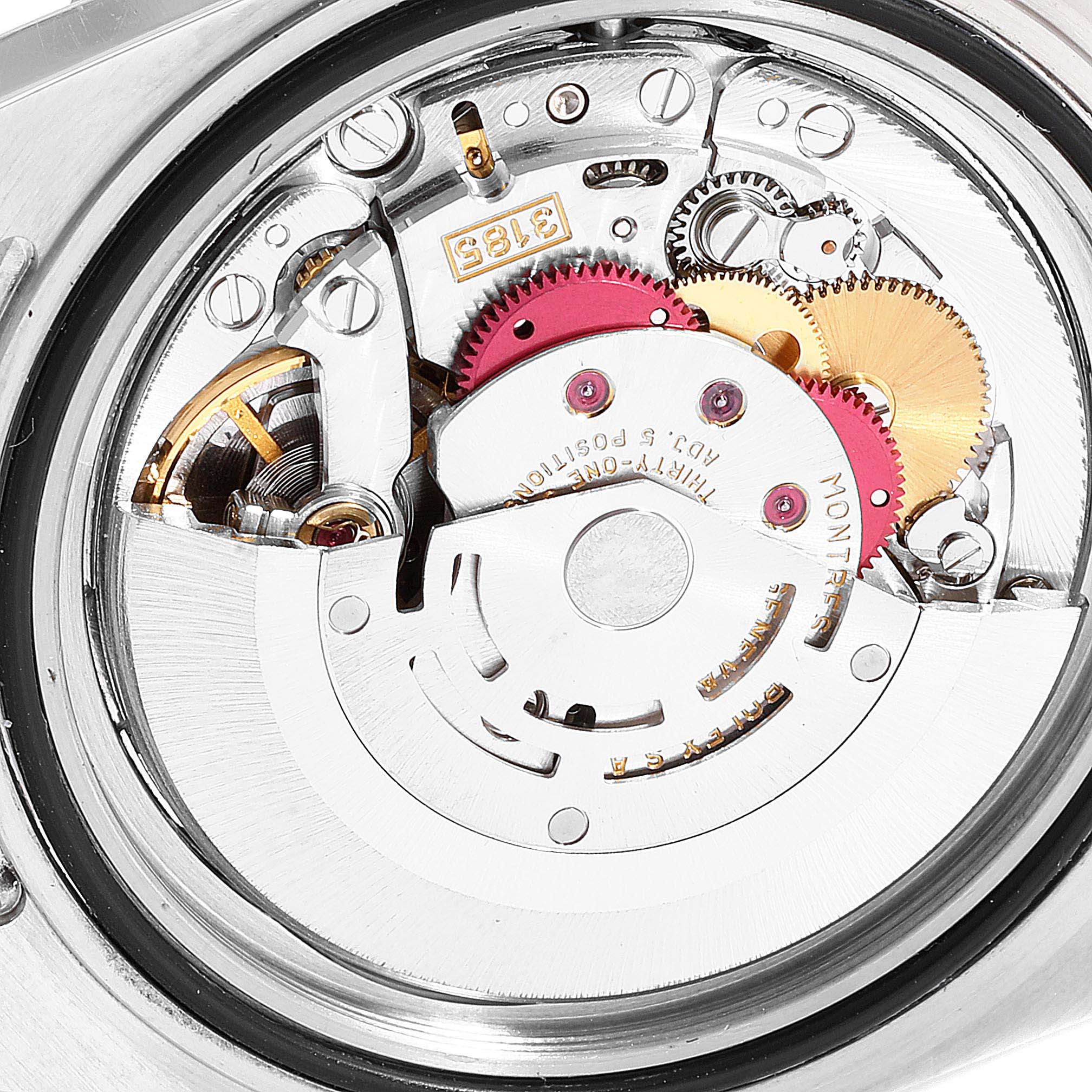 The image shows the internal movement mechanism of a Rolex GMT-Master 16713  Men's Steel and Gold (two tone) Black Dial 16713  Men's Steel and Gold (two tone) Black Dial watch from a close-up, back angle.