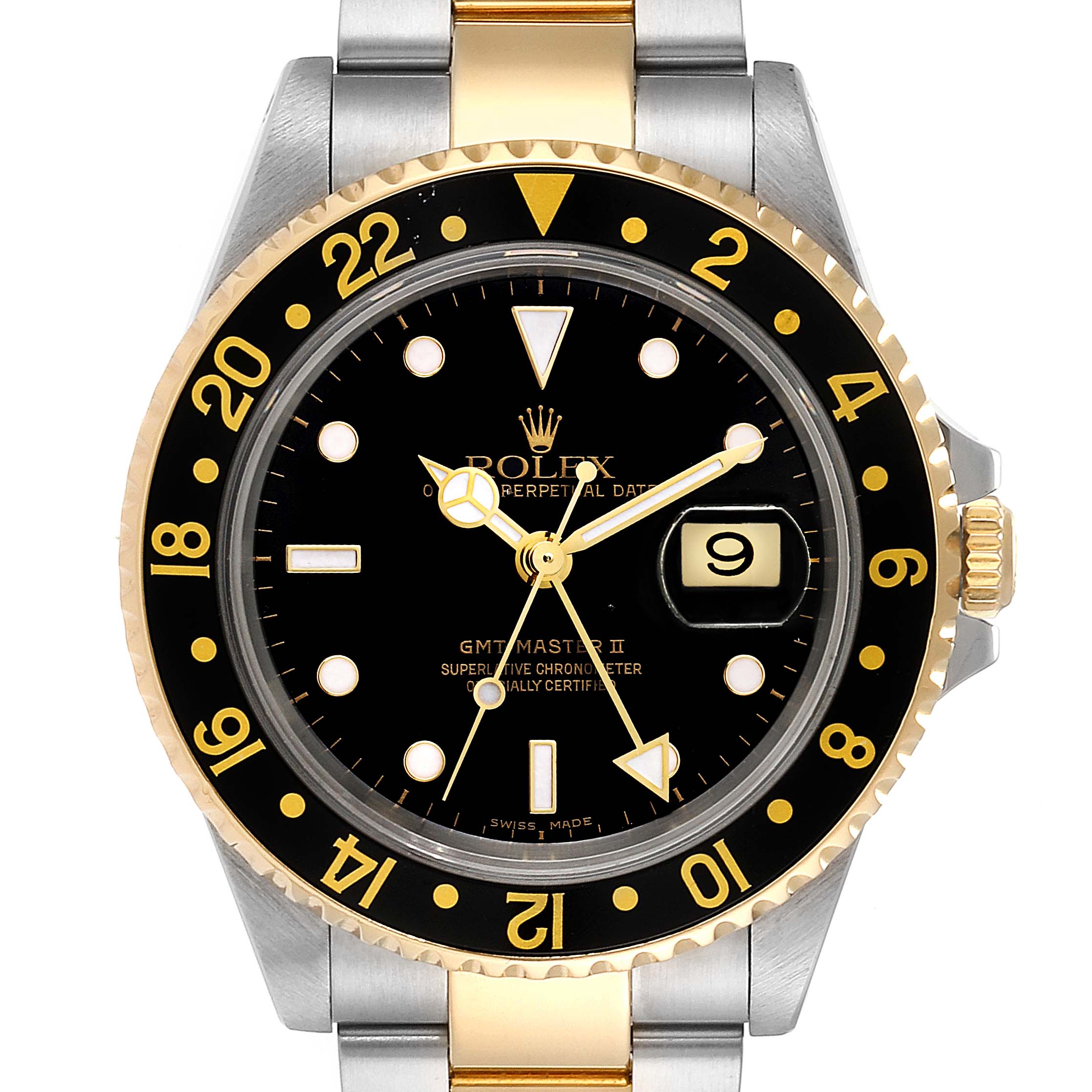 The image shows a front view of a Rolex GMT-Master 16713  Men's Steel and Gold (two tone) Black Dial 16713  Men's Steel and Gold (two tone) Black Dial II watch, highlighting the dial, bezel, and part of the bracelet.
