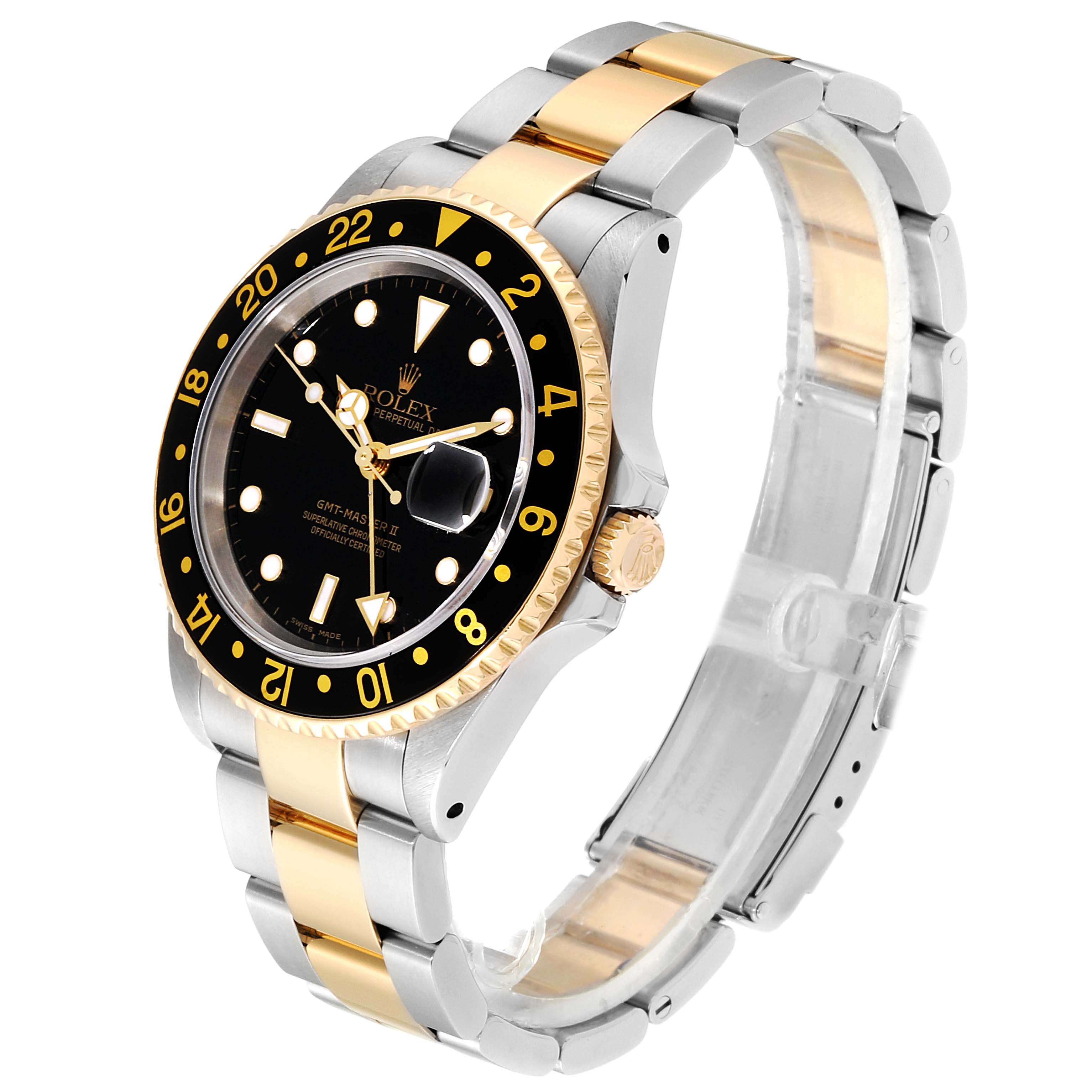 This image shows a side and front view of a Rolex GMT-Master 16713  Men's Steel and Gold (two tone) Black Dial 16713  Men's Steel and Gold (two tone) Black Dial watch, highlighting its bezel, dial, and two-tone bracelet.