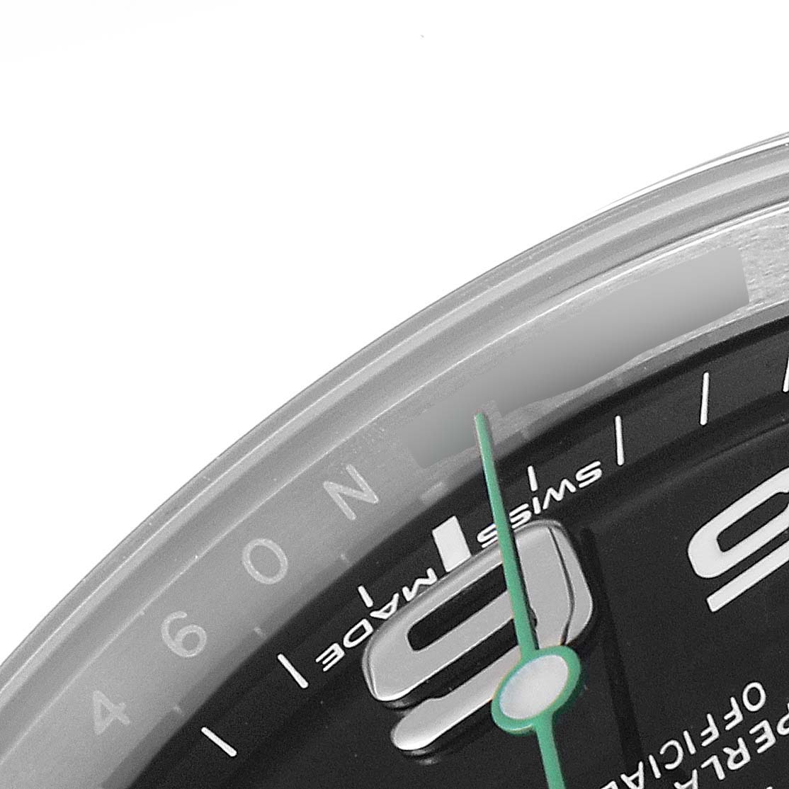 This image shows a close-up of the dial and minute hand of a Rolex Air-King 116900 Men's Stainless Steel Black Dial 116900 Men's Stainless Steel Black Dial watch, viewed from an angled perspective.