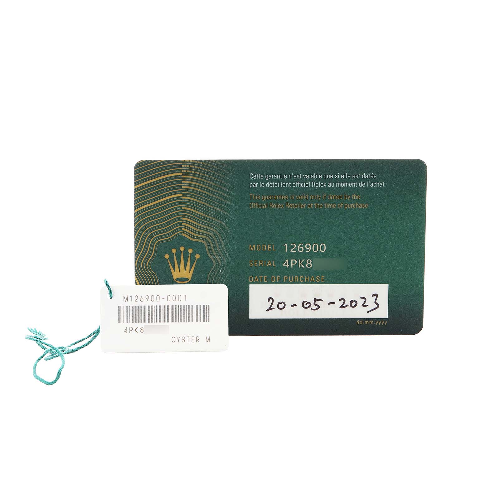 The image shows a Rolex Air-King 126900 Men's Stainless Steel Black Dial model warranty card and tag with model and serial numbers.