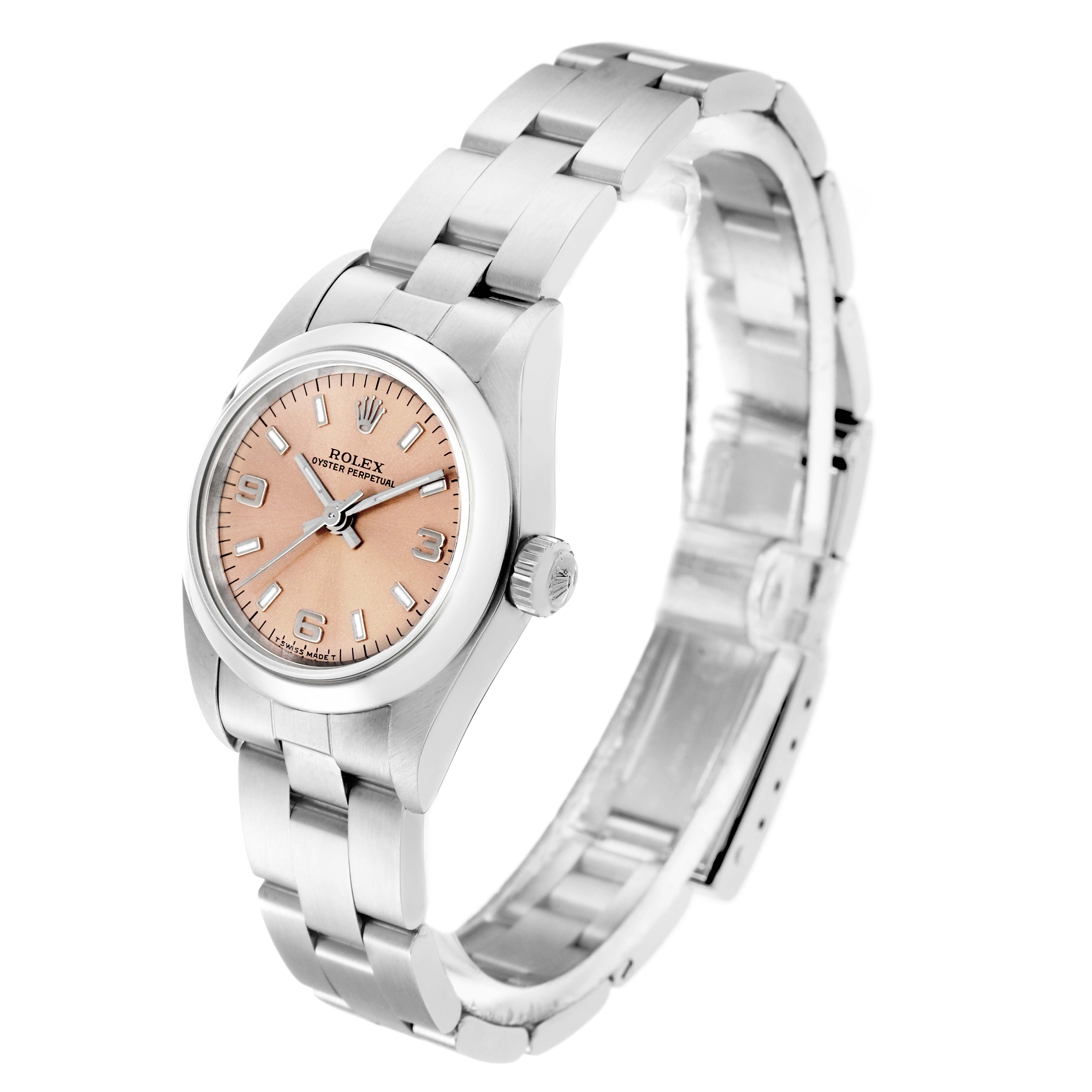 The Rolex Oyster Perpetual 76080 Women
s Stainless Steel Pink Dial 76080 Women
s Stainless Steel Pink Dial watch is shown from a three-quarter angle, displaying the face, crown, and a portion of the bracelet.
