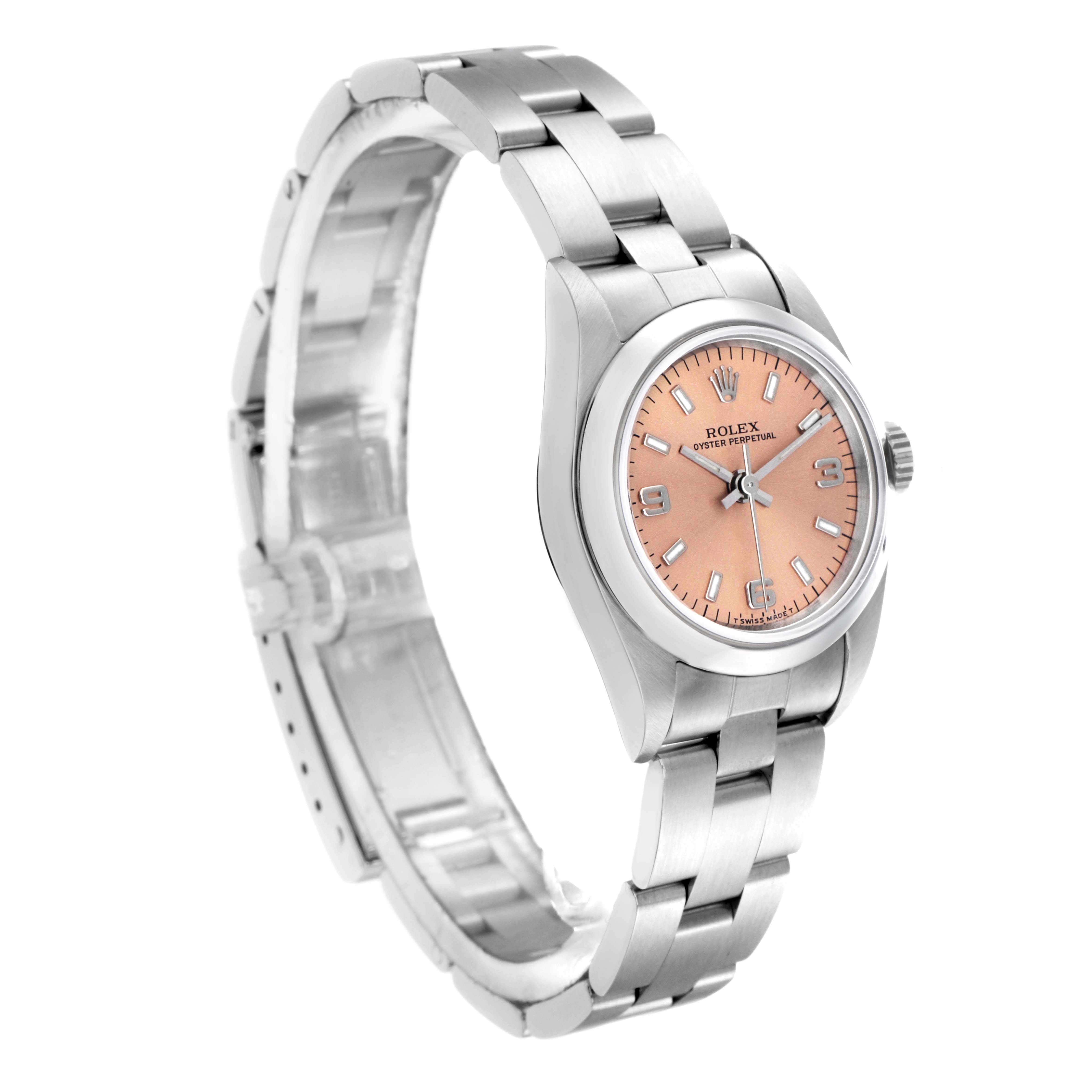 The Rolex Oyster Perpetual 76080 Women
s Stainless Steel Pink Dial 76080 Women
s Stainless Steel Pink Dial watch is shown at a three-quarter angle with a focus on its bracelet, case, and dial.
