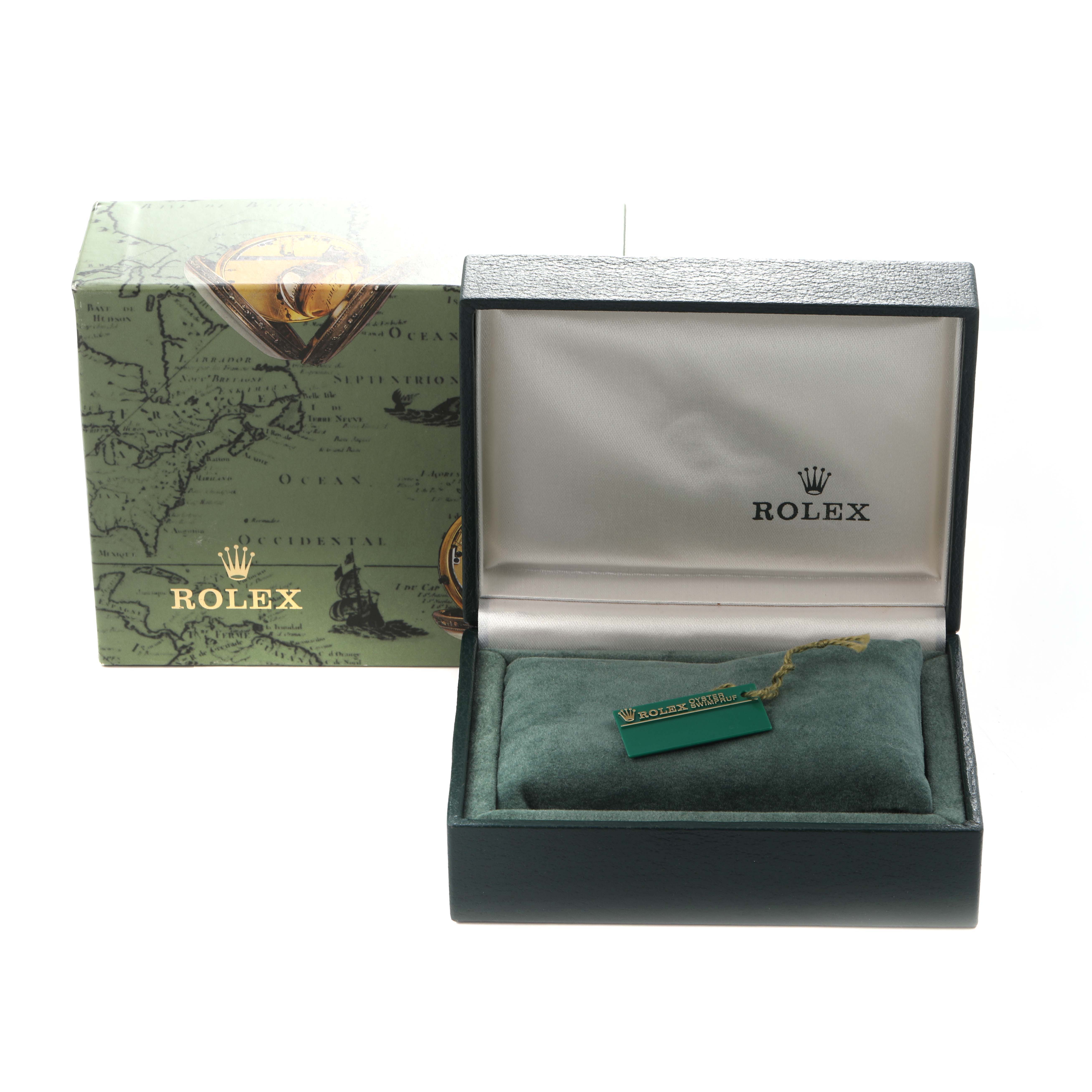 The image shows a Rolex Oyster Perpetual 76080 Women
s Stainless Steel Pink Dial 76080 Women
s Stainless Steel Pink Dial box with a cushion and tag, viewed from the front.