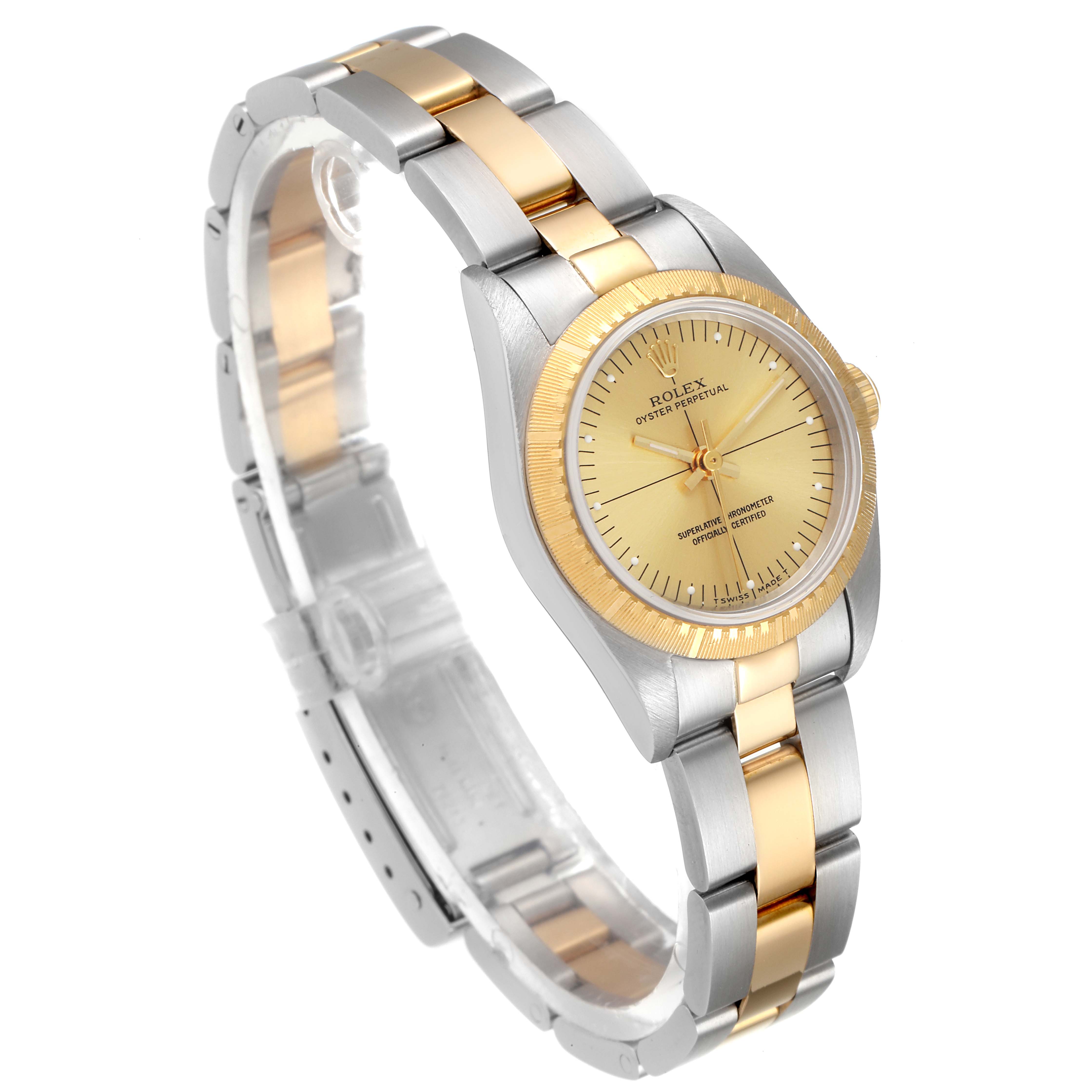 The Rolex Oyster Perpetual 76243 Women
s Steel and Gold (two tone) Champagne Dial 76243 Women
s Steel and Gold (two tone) Champagne Dial watch is shown at a slight angle, displaying the face, bezel, and bracelet.