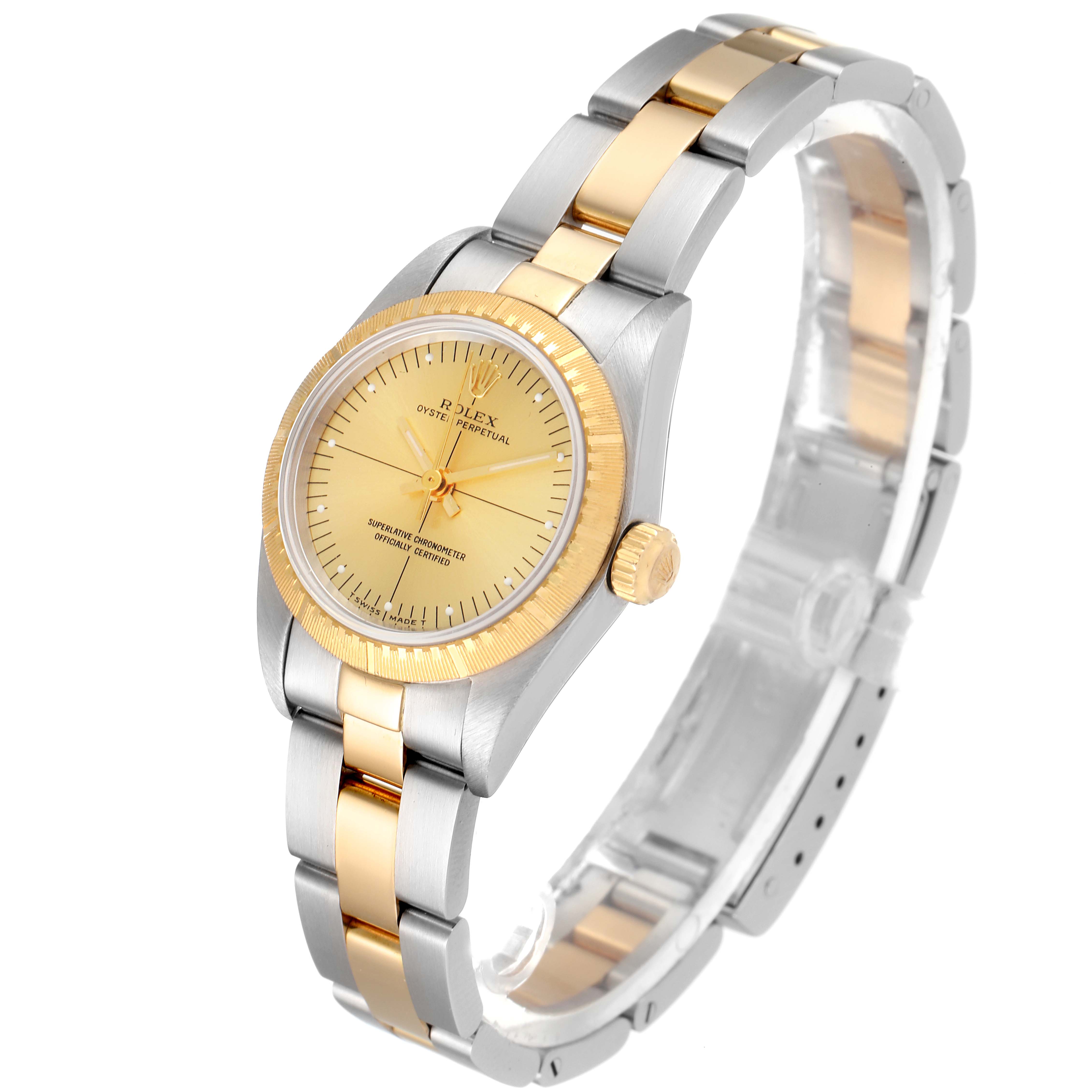The image shows a Rolex Oyster Perpetual 76243 Women
s Steel and Gold (two tone) Champagne Dial 76243 Women
s Steel and Gold (two tone) Champagne Dial watch at an angle highlighting the face, bezel, crown, and part of the bracelet.