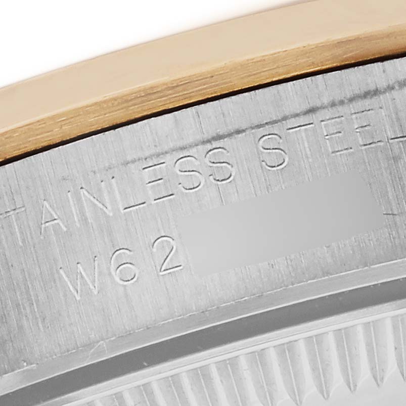This is a close-up of the stainless steel case back on a Rolex Oyster Perpetual 67183 Women's Steel and Gold (two tone) Grey Dial 67183 Women's Steel and Gold (two tone) Grey Dial watch.