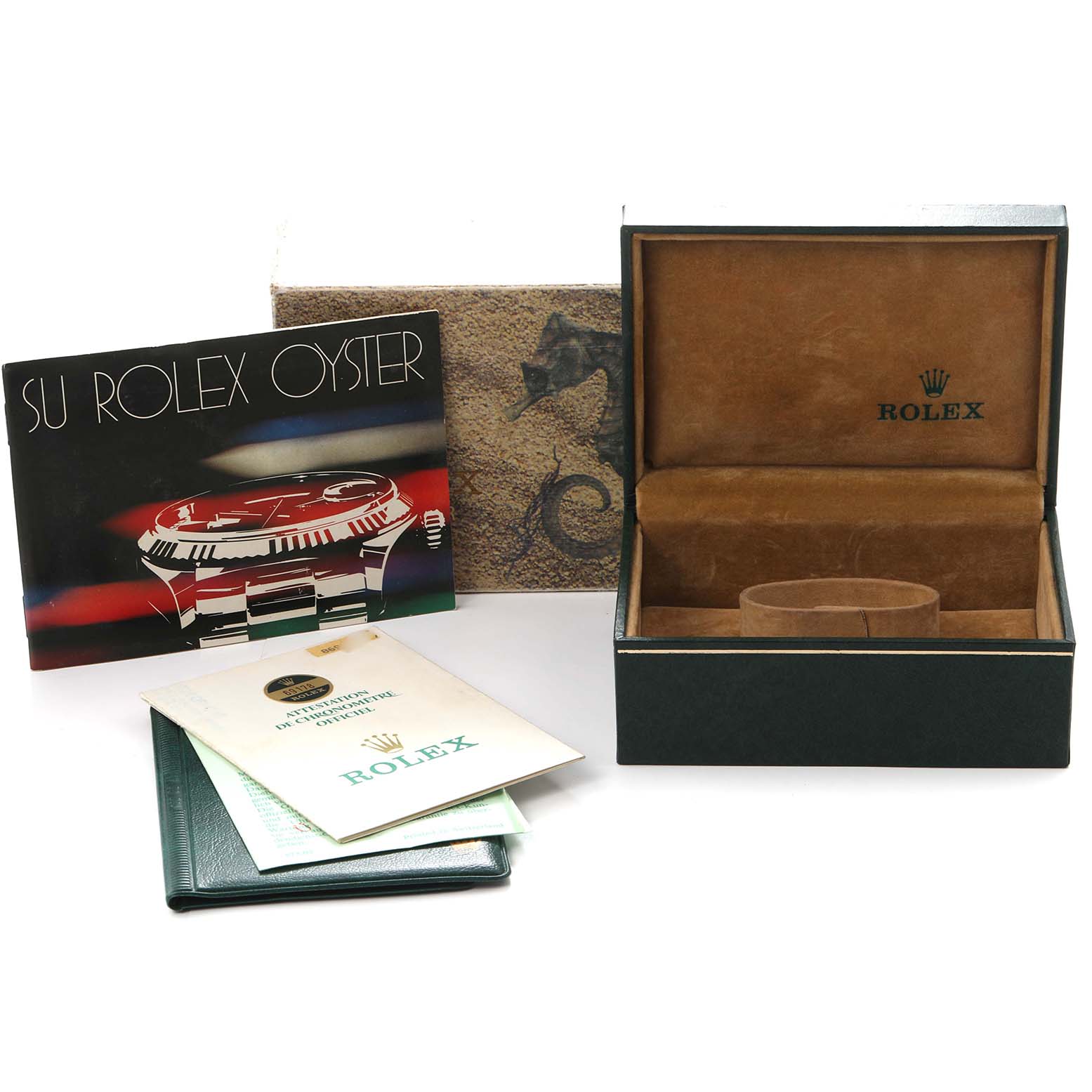 The image shows the packaging and accessories for a Rolex President 69178 Women
s Yellow Gold Champagne Dial 69178 Women
s Yellow Gold Champagne Dial model, including a box, manual, pamphlets, and outer box.