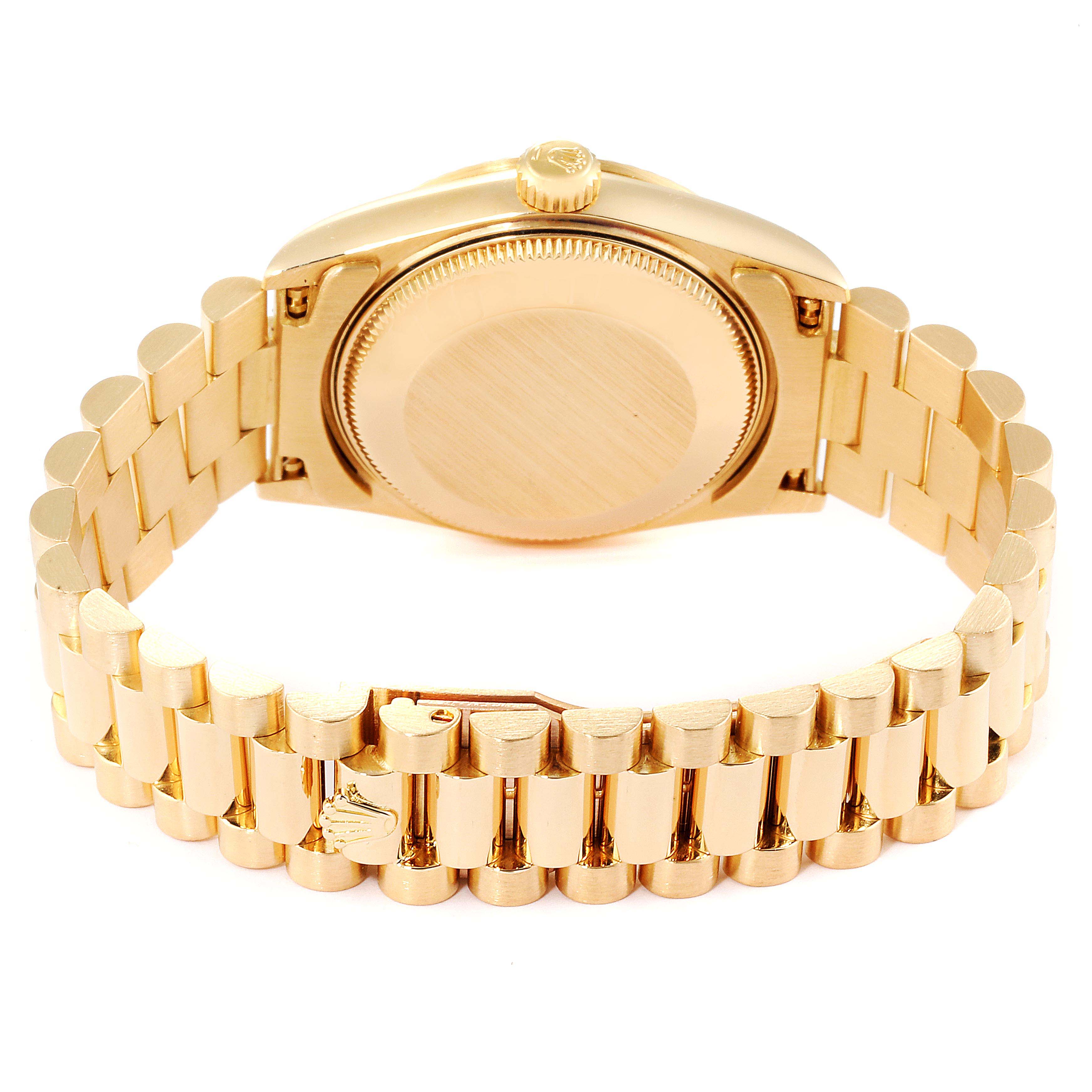 The image shows the back view of a Rolex President 68278 Women
s Yellow Gold Champagne Dial 68278 Women
s Yellow Gold Champagne Dial watch, highlighting its gold bracelet and case back.