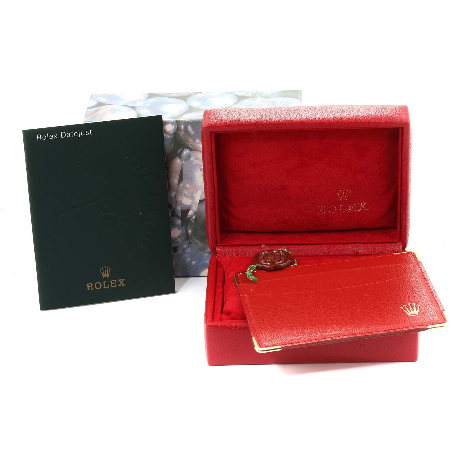 The image shows Rolex President 79178 Women
s Yellow Gold Champagne Dial 79178 Women
s Yellow Gold Champagne Dial watch accessories, including its red box, certificate holder, and a booklet from a straight angle.