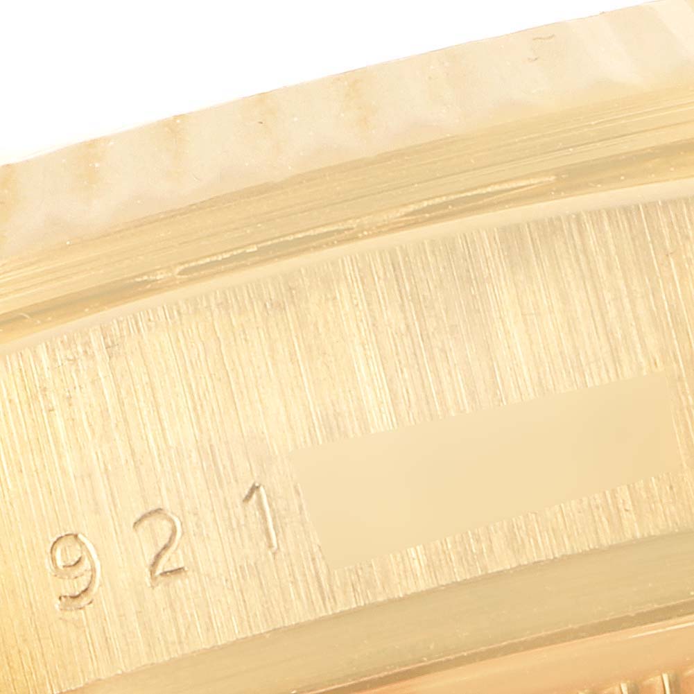 The image shows a close-up of the serial number engraved on the case of a Rolex President 18038 Men
s Yellow Gold White Dial 18038 Men
s Yellow Gold White Dial model watch.