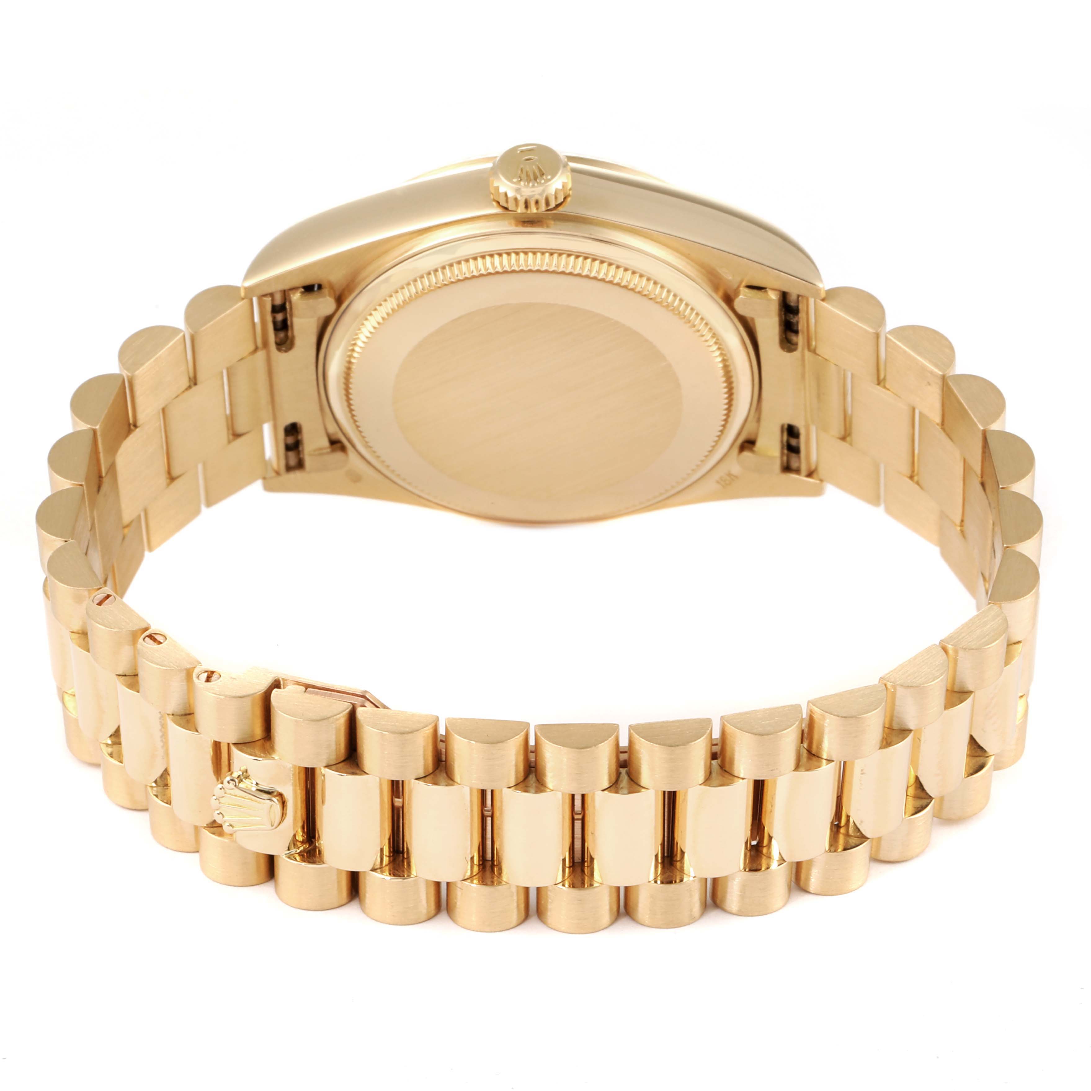 The image shows the back case and bracelet of the Rolex President 18038 Men
s Yellow Gold White Dial 18038 Men
s Yellow Gold White Dial model watch from a bottom rear angle.