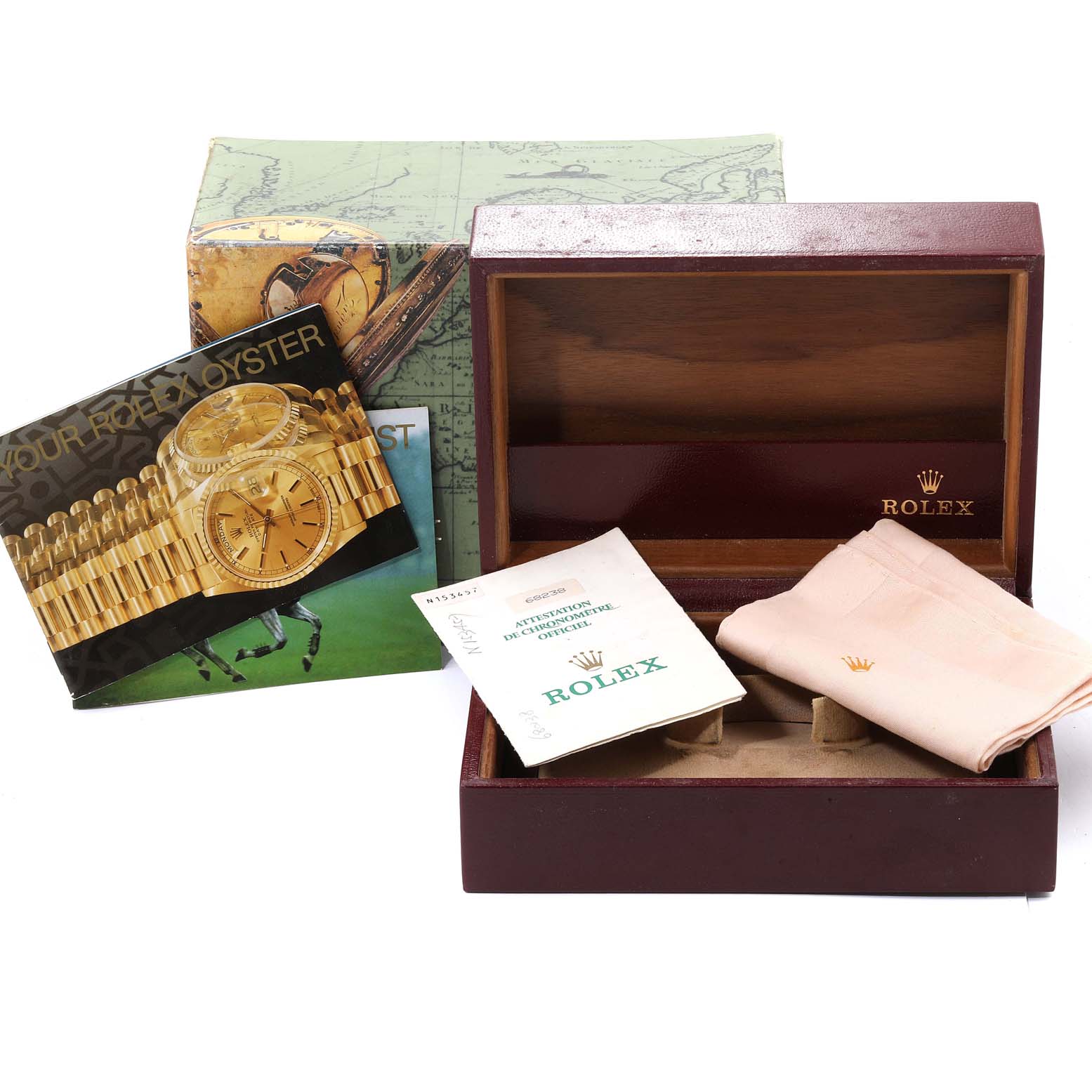 The image shows a Rolex President 68238  Women
s Yellow Gold Champagne Dial 68238  Women
s Yellow Gold Champagne Dial model watch box and accessories, including booklets and a cleaning cloth.