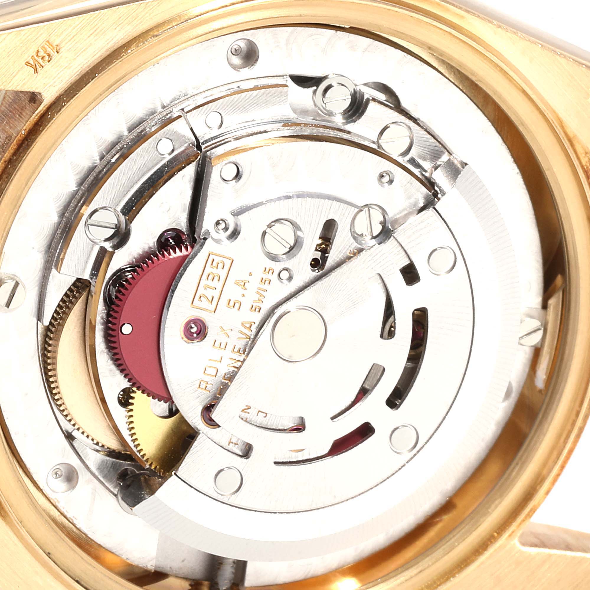 The image shows the internal mechanics of a Rolex President 68238  Women
s Yellow Gold Champagne Dial 68238  Women
s Yellow Gold Champagne Dial model watch from a close-up angle.